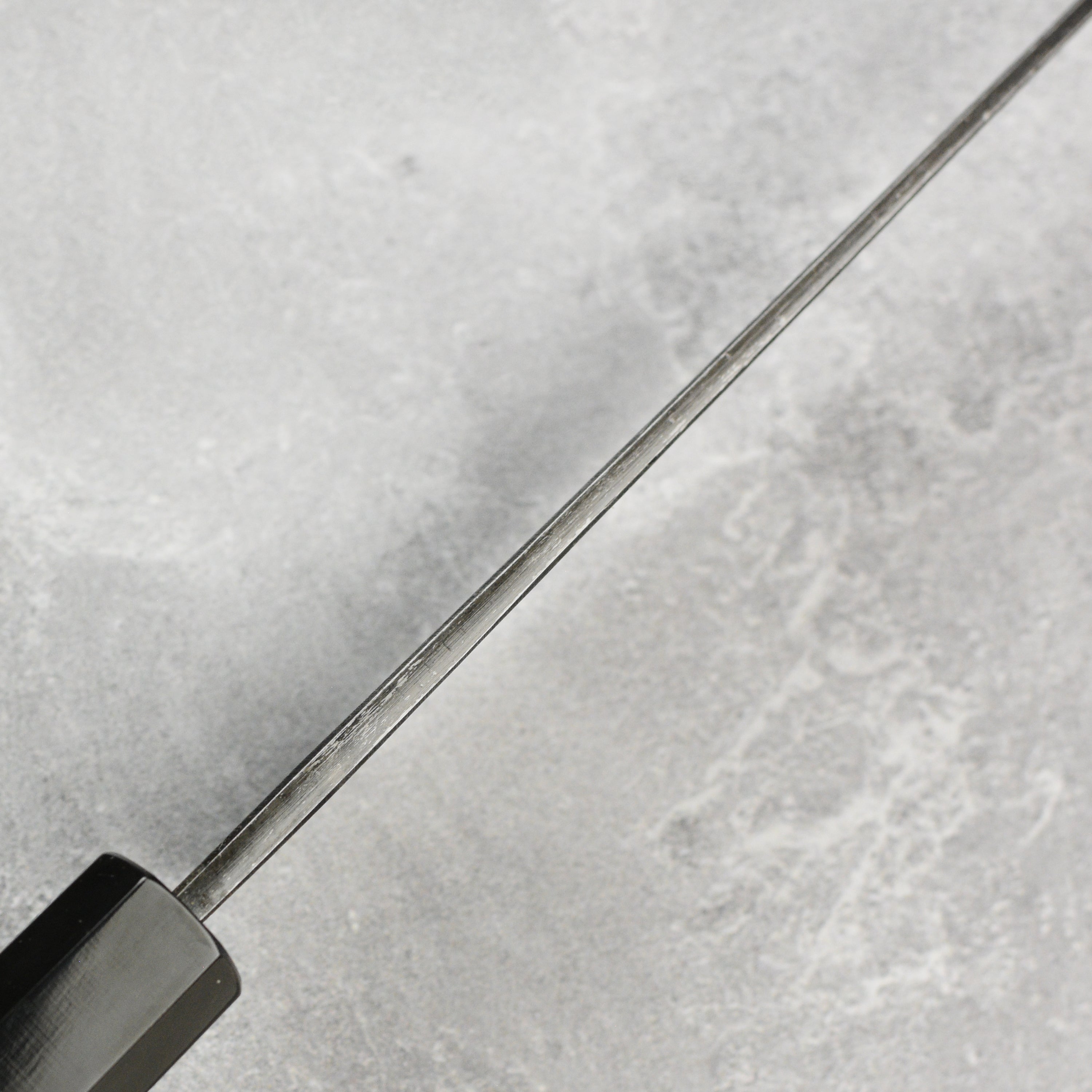 Full view of the Japanese knife with ergonomic handle