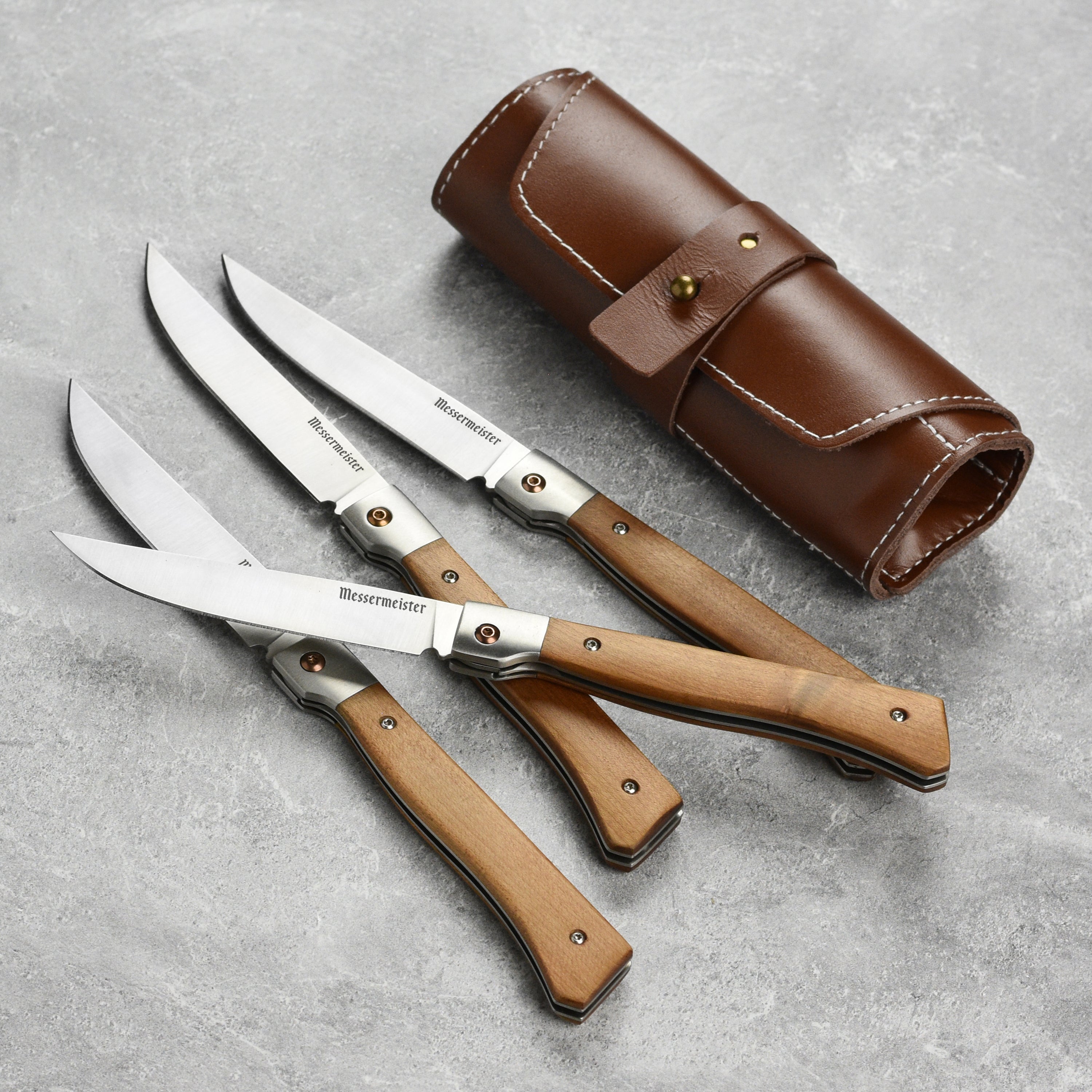 Folding steak knives with German steel blades and leather roll for easy transport