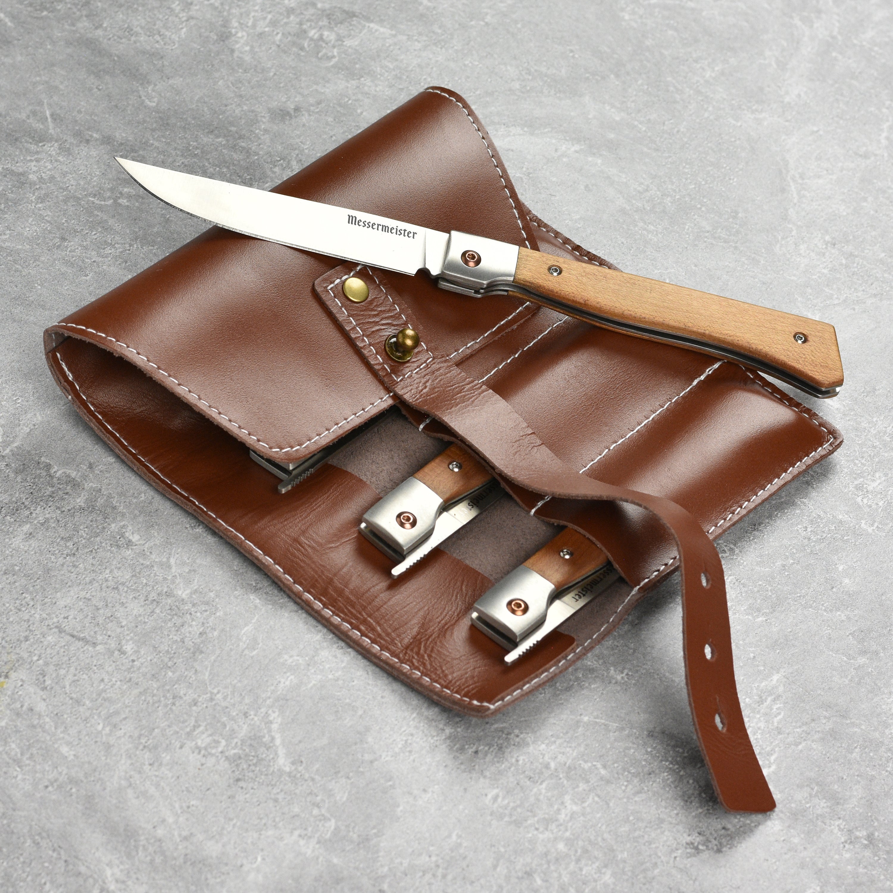 Folding steak knives with German steel blades and leather roll for easy transport