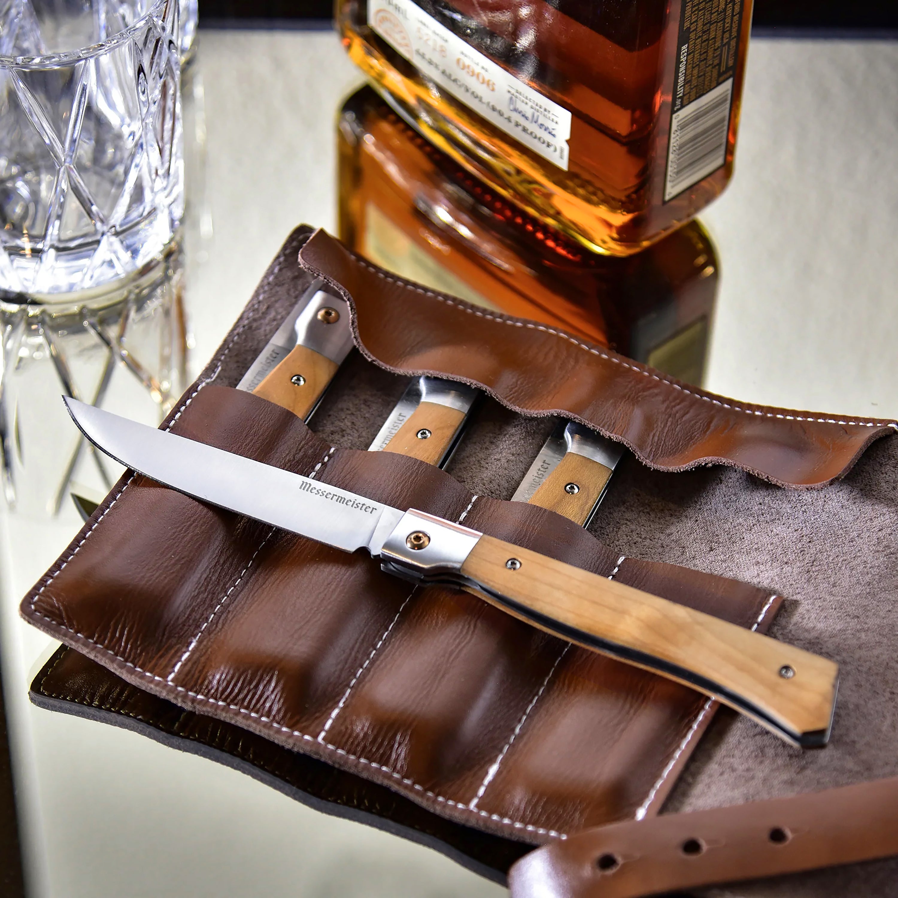 Leather roll with Messermeister folding steak knives inside, perfect for travel
