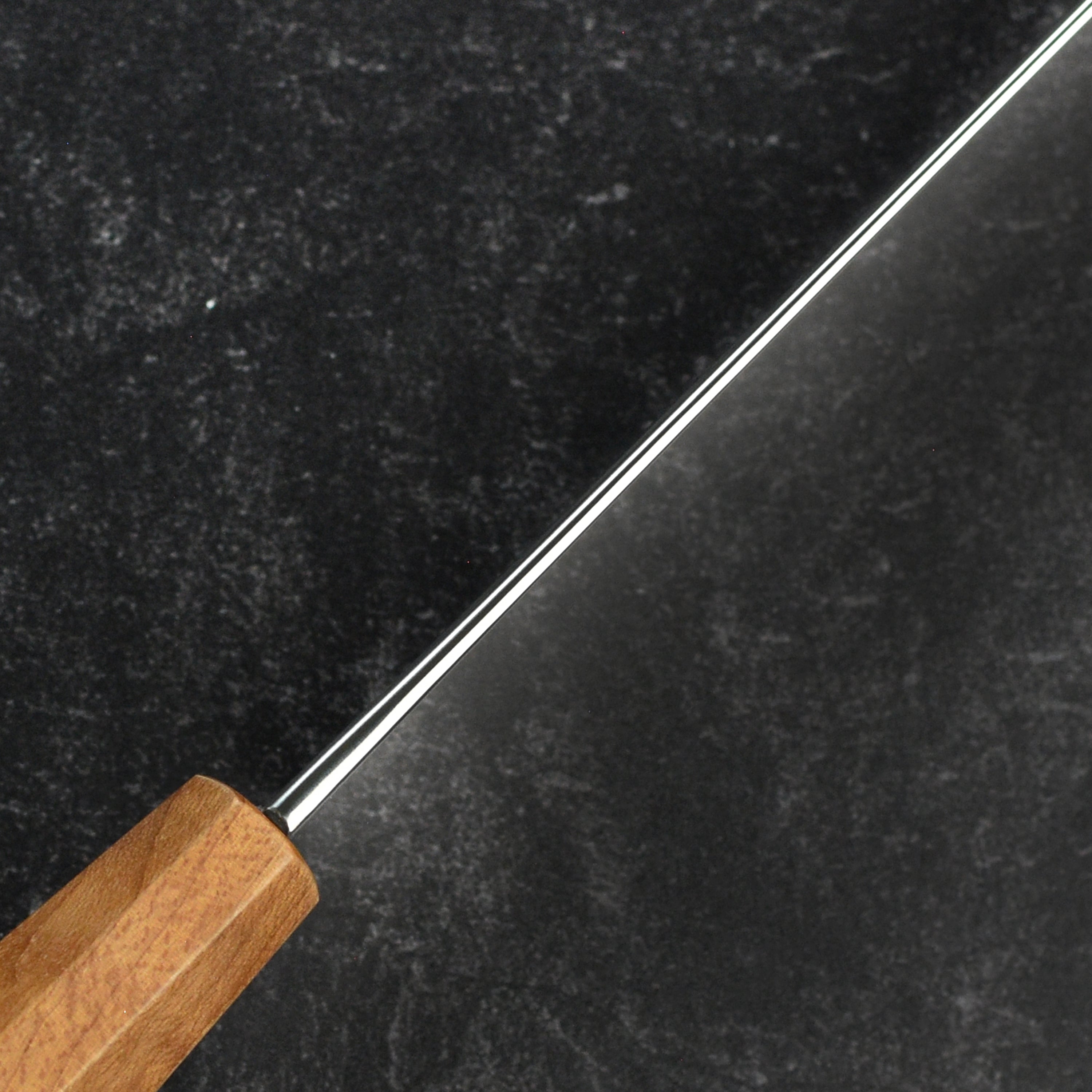 Elegant handle and sharp blade of a top-rated Japanese chefs knife for cooking