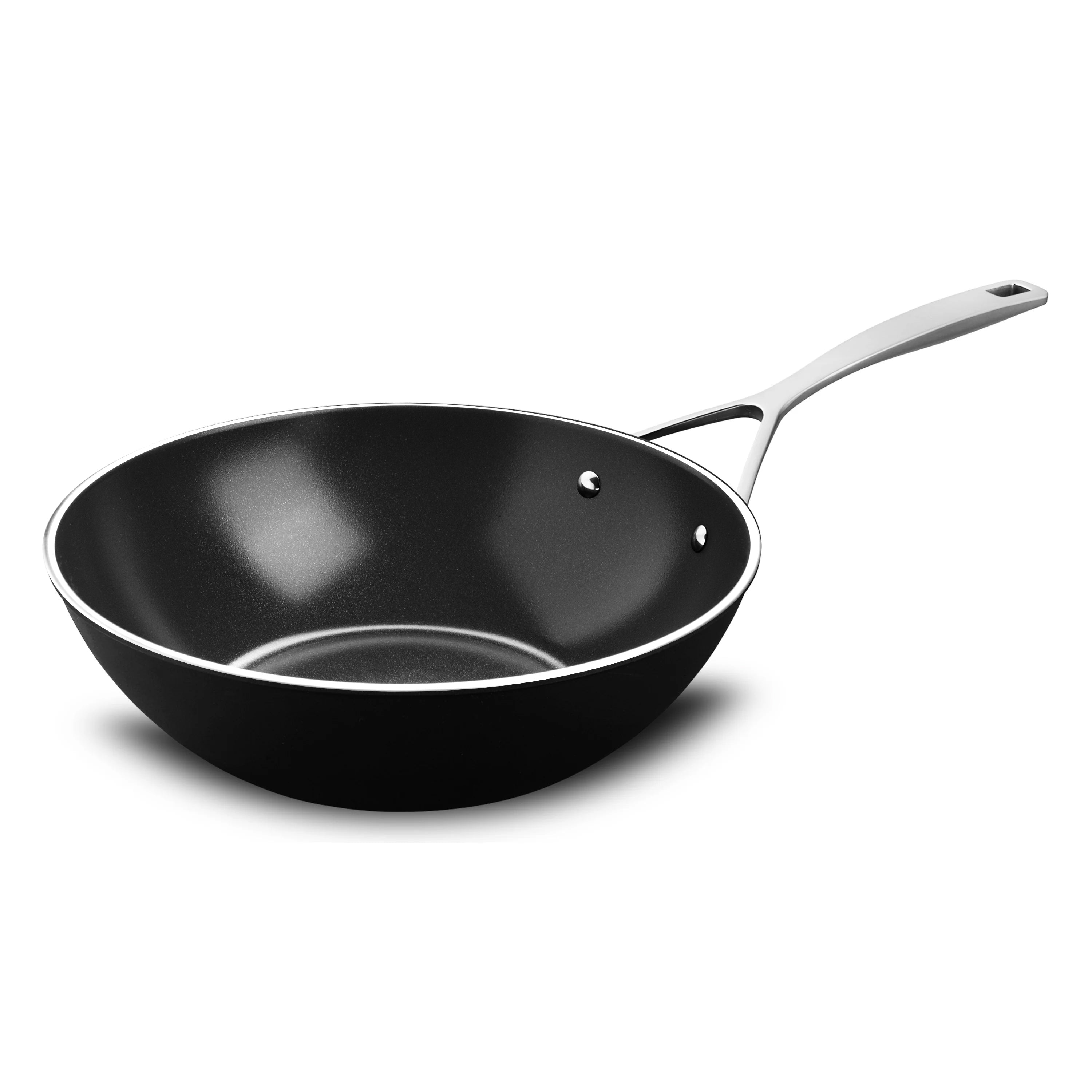 Overhead view of ceramic wok on induction cooktop, showcasing even heat distribution