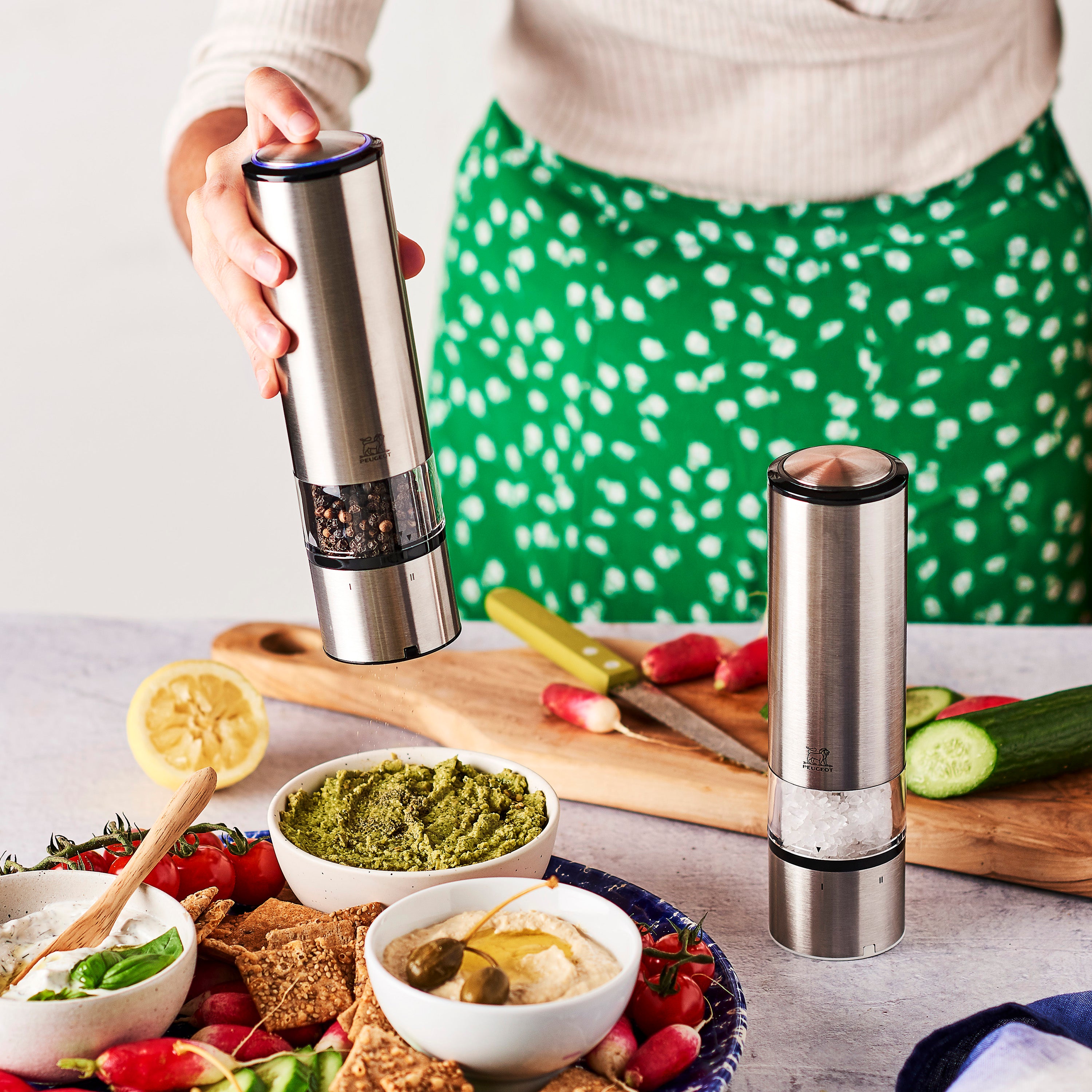 Side view of the Peugeot stainless steel pepper grinder showing the grinding mechanism