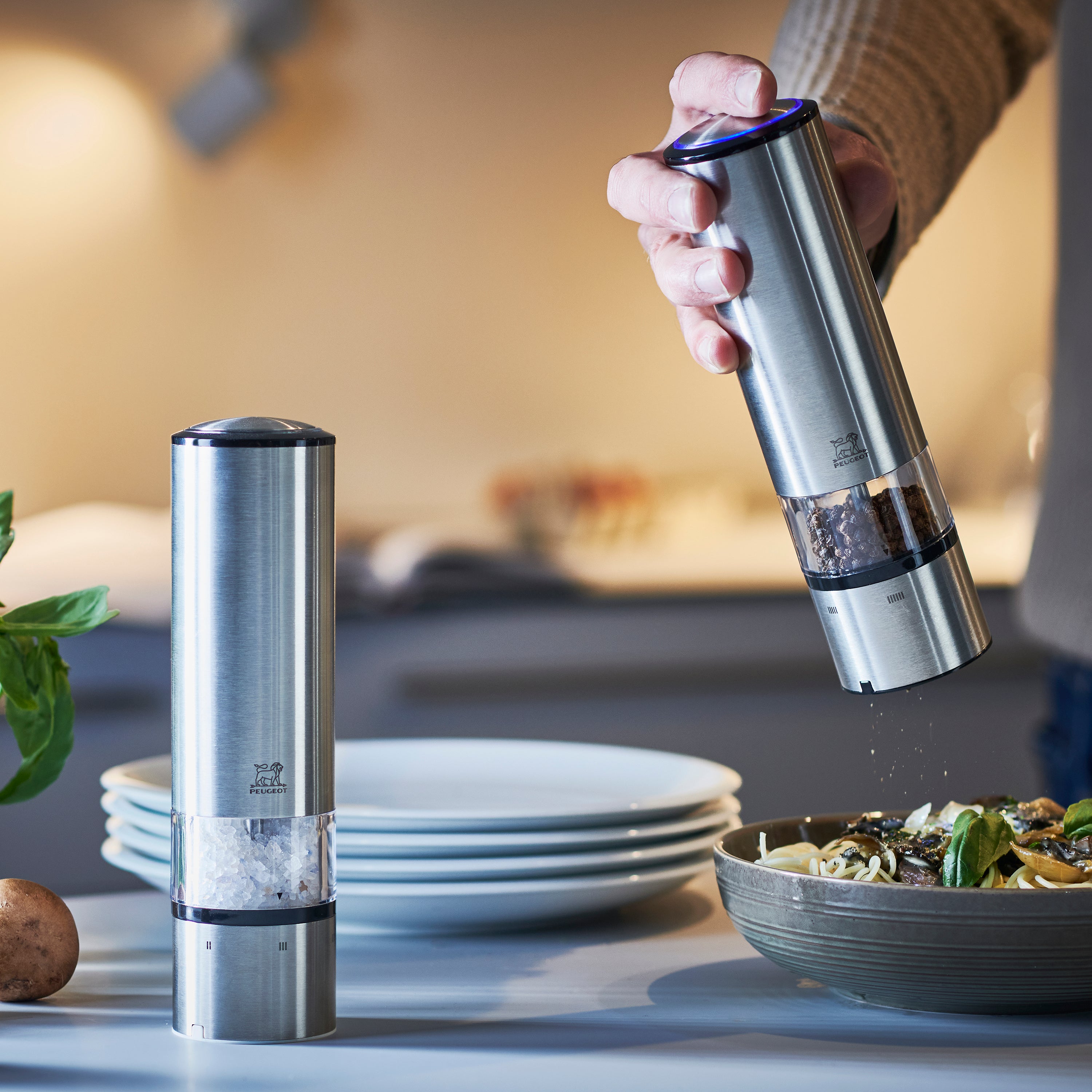 Side view of the Peugeot stainless steel pepper grinder showing the grinding mechanism
