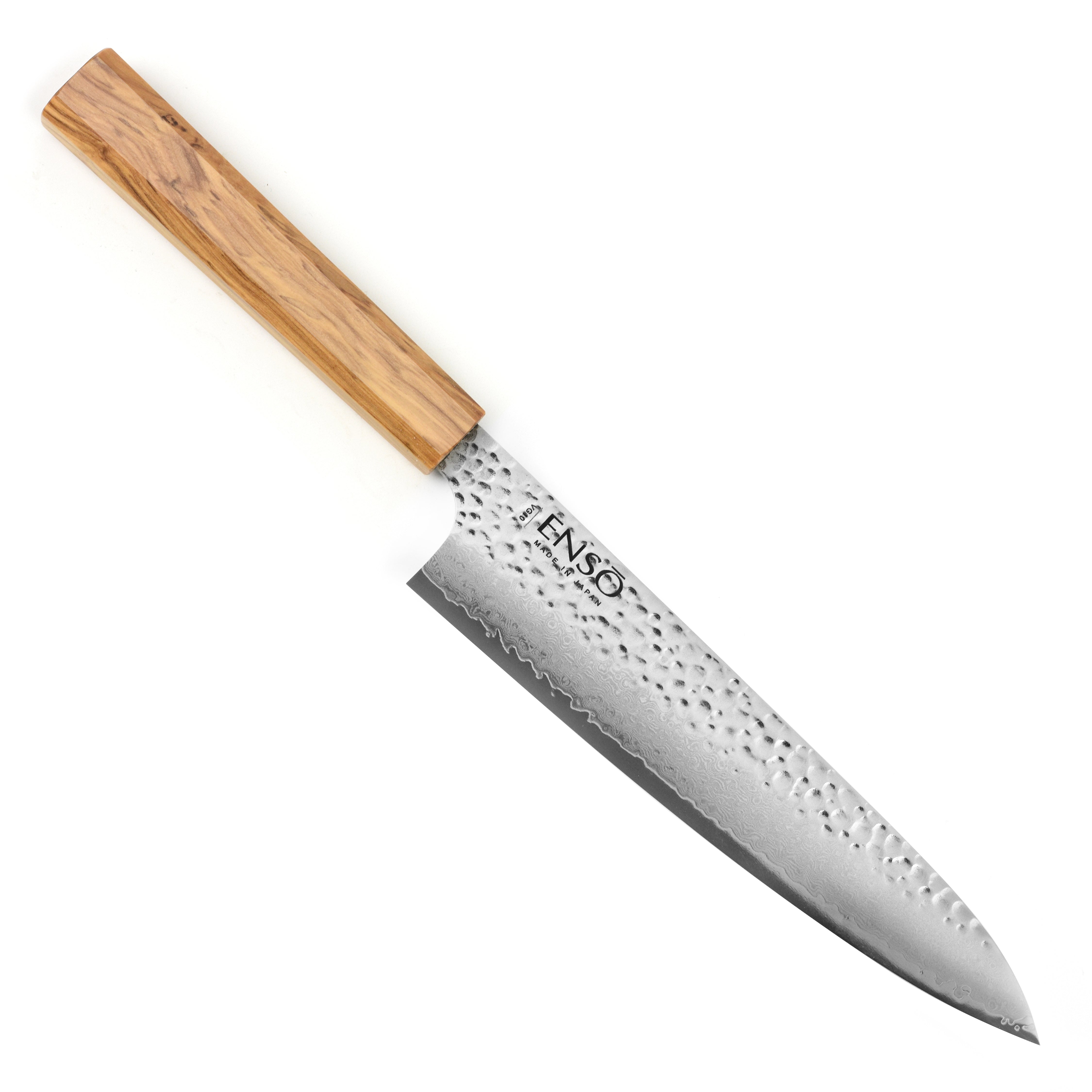 Professional chef knife in use chopping vegetables with ergonomic olivewood handle
