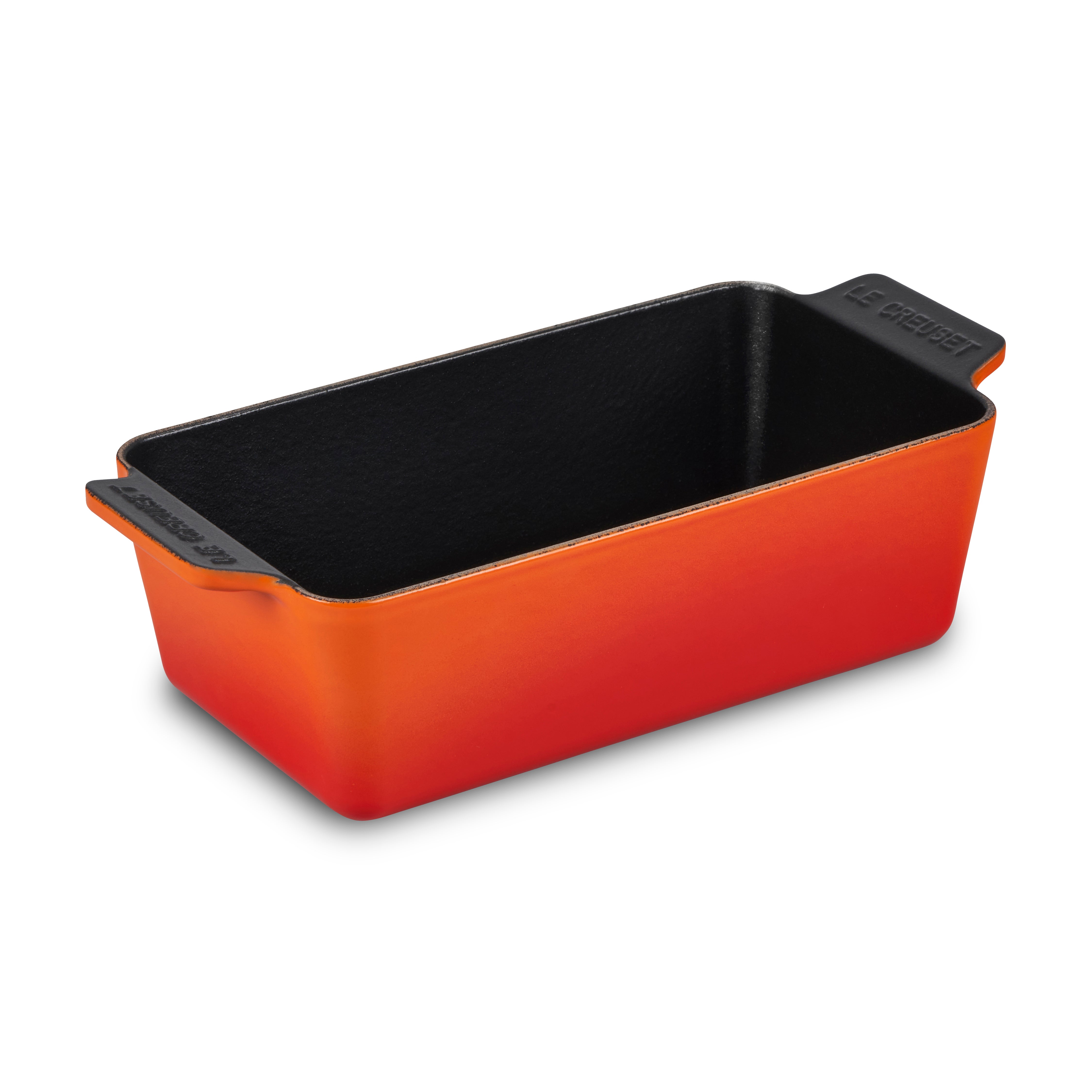 Le Creuset cast iron loaf pan showcasing its vibrant flame color and durable enamel finish.