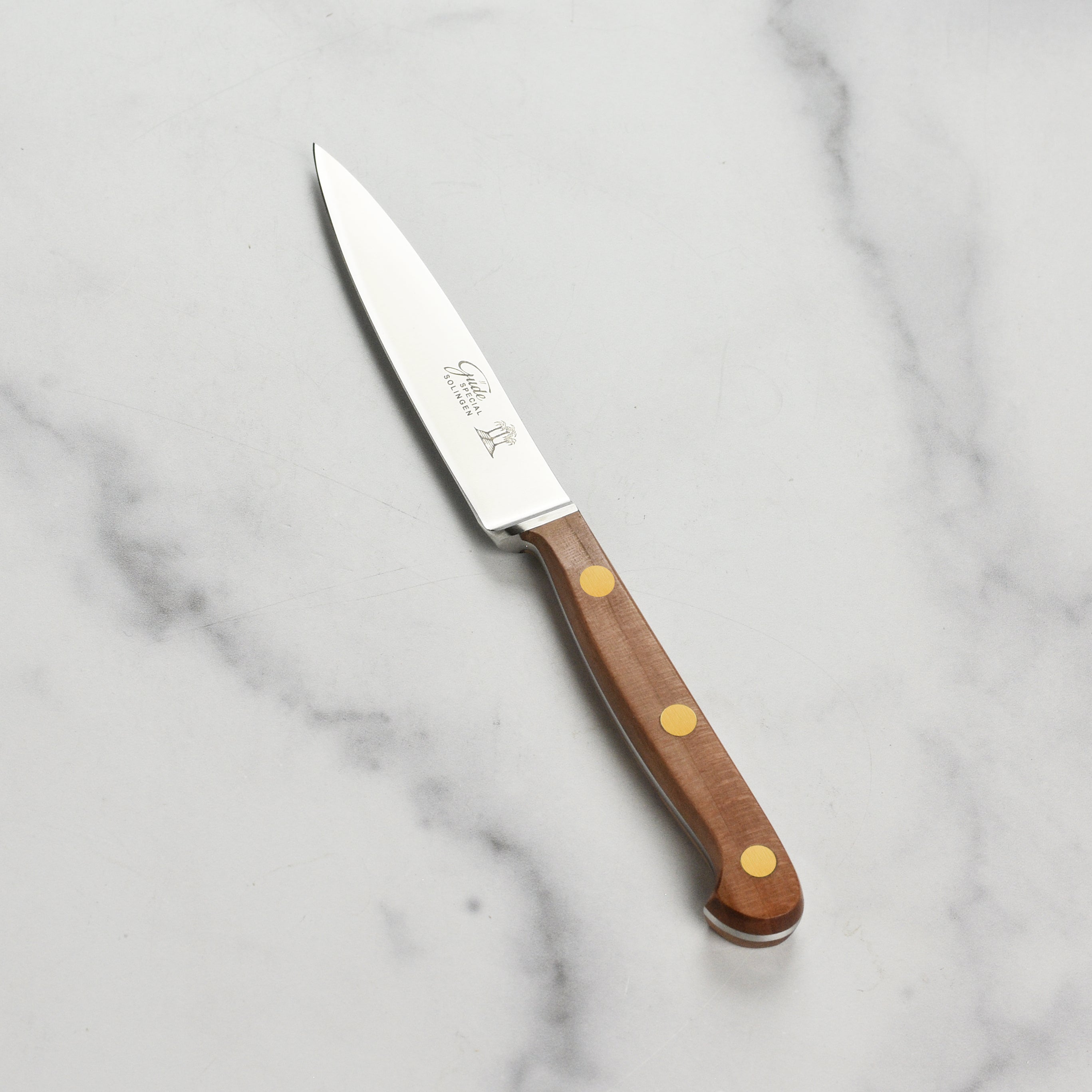 Elegant display of the PrecisionCraft paring knife highlighting its craftsmanship and design.