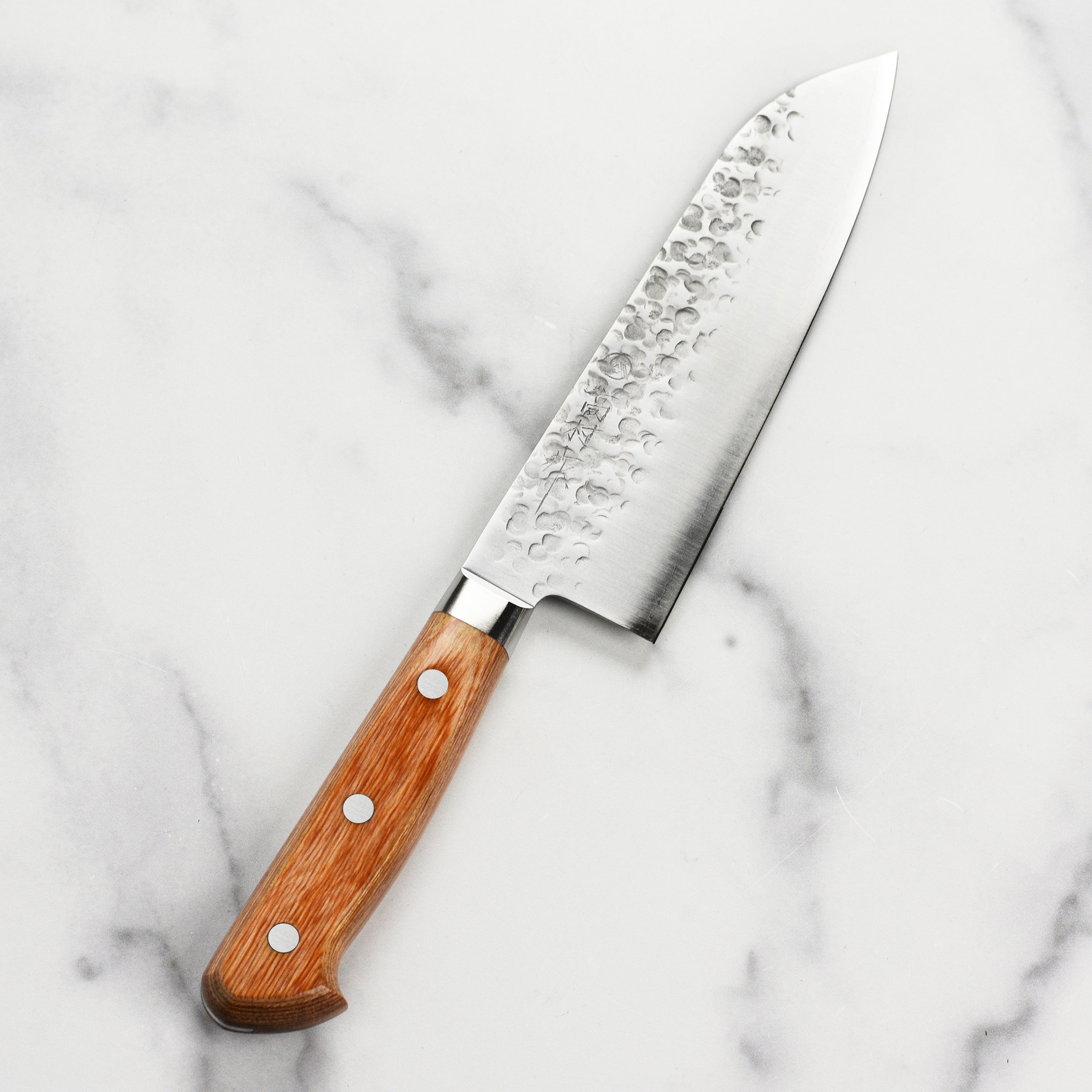 Takamura Chromax Tsuchime 6.7-inch Japanese Santoku knife with textured blade for versatile kitchen use