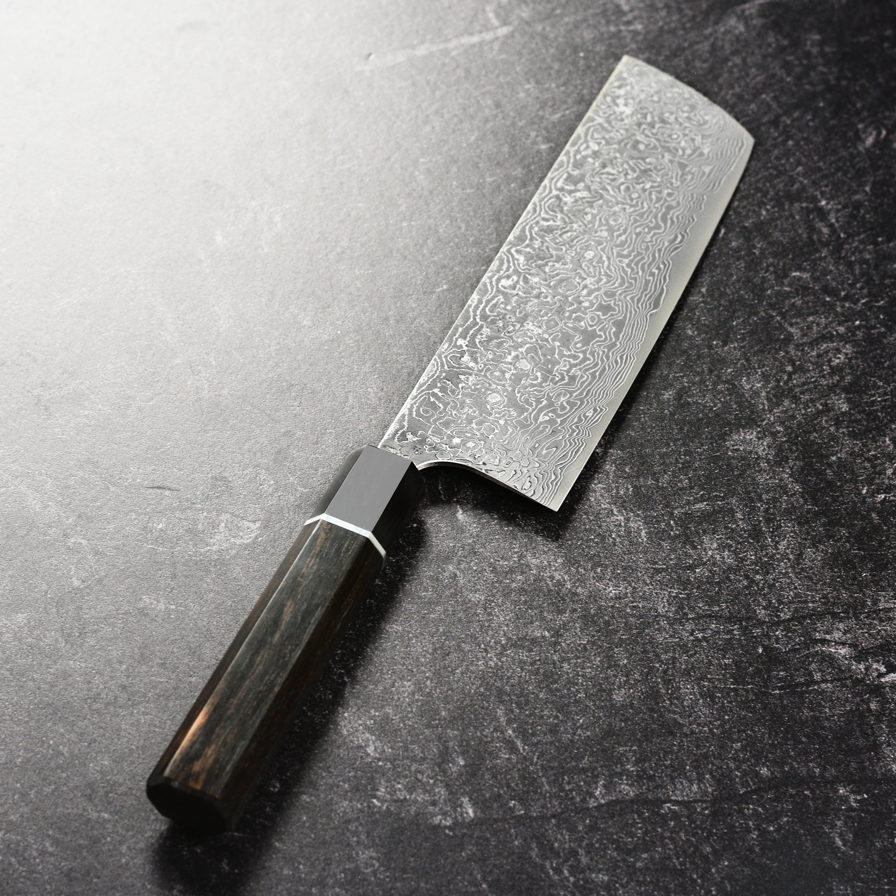 Elegant presentation of the Saji SG2 knife in its wooden gift box, perfect for gifting.