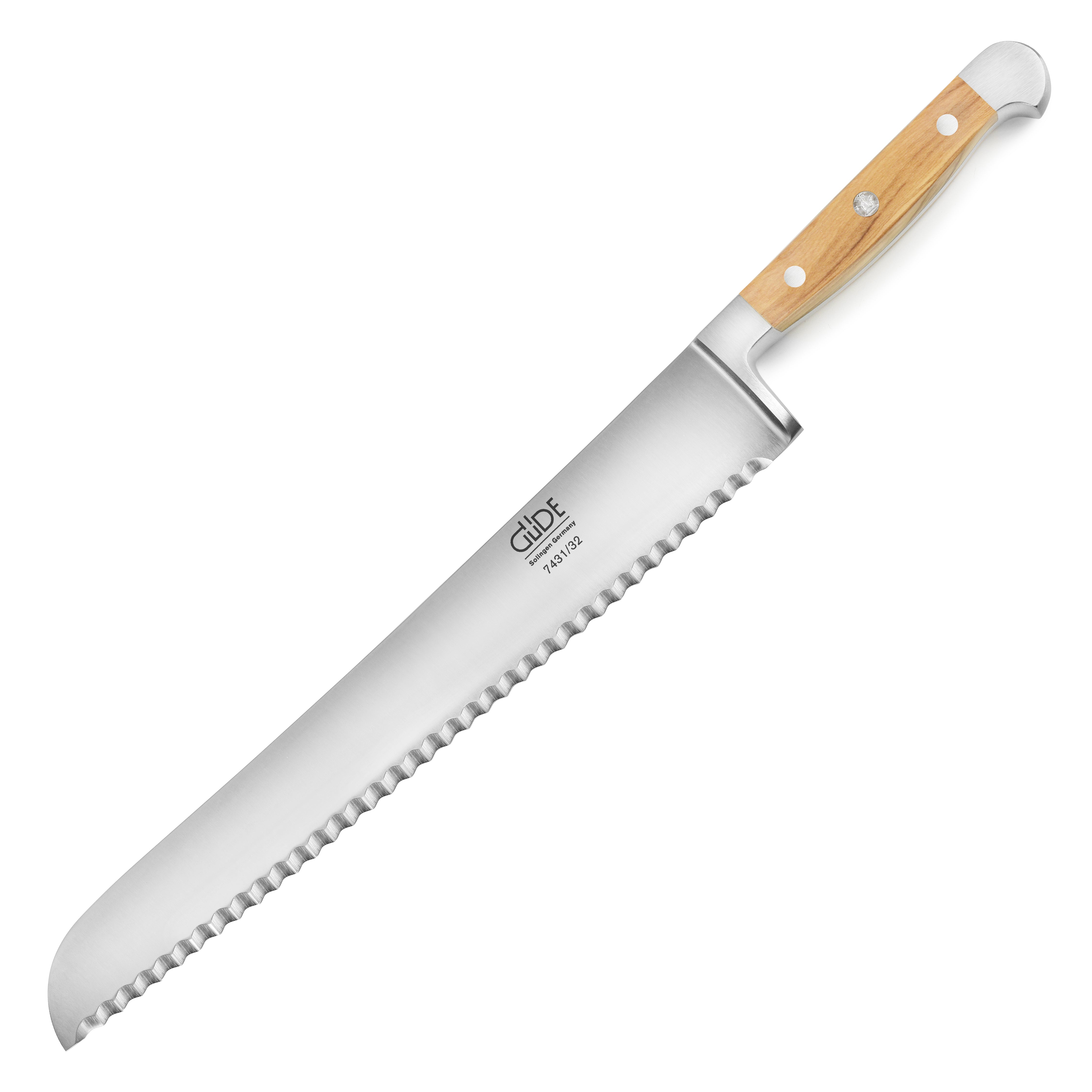 Close-up of Franz Gude 12.6-inch bread knife with olive wood handle, showing serrated edge for crusty bread
