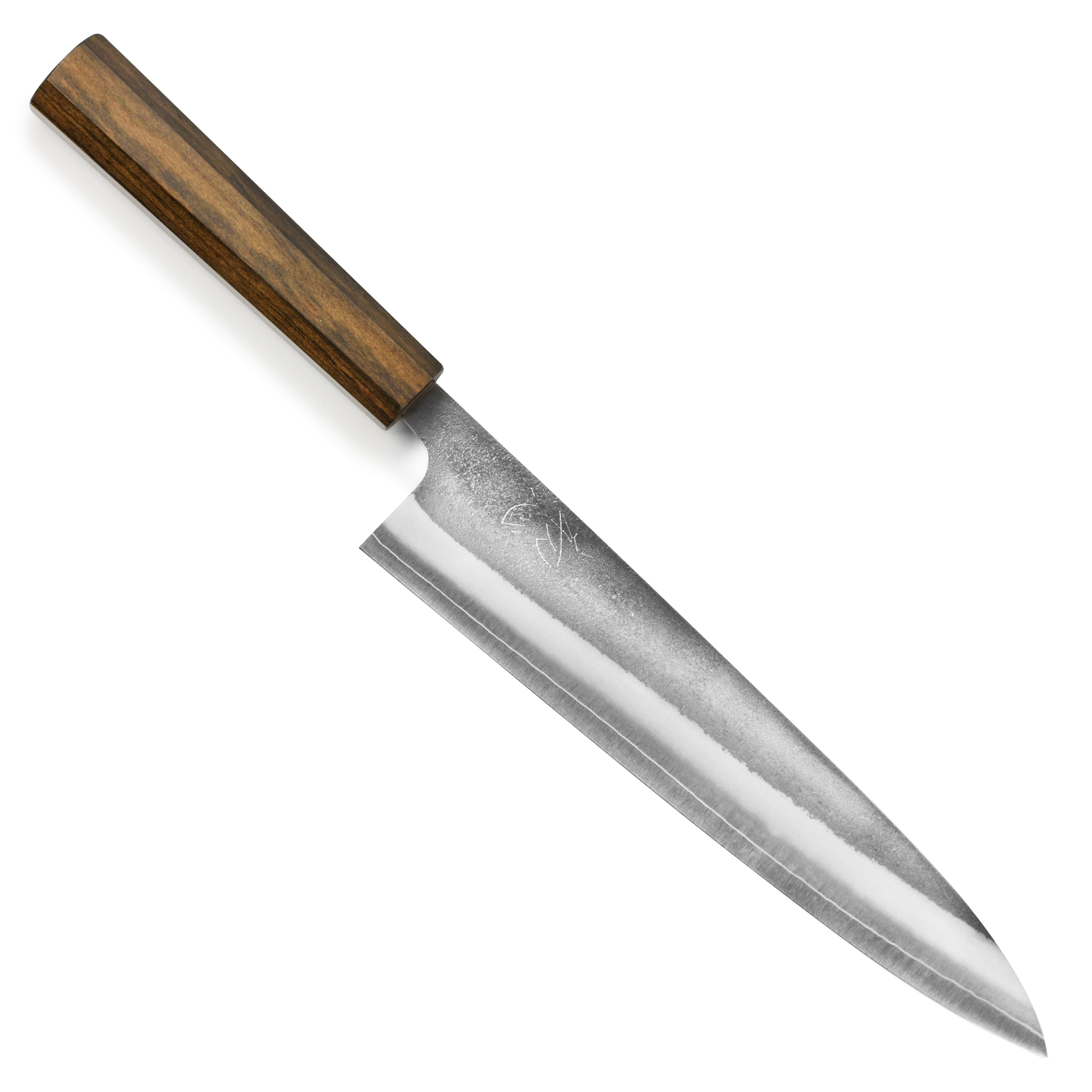 Yoshikane SKD Nashiji Gyuto Knife from a side angle, highlighting its sharp blade and sleek design.