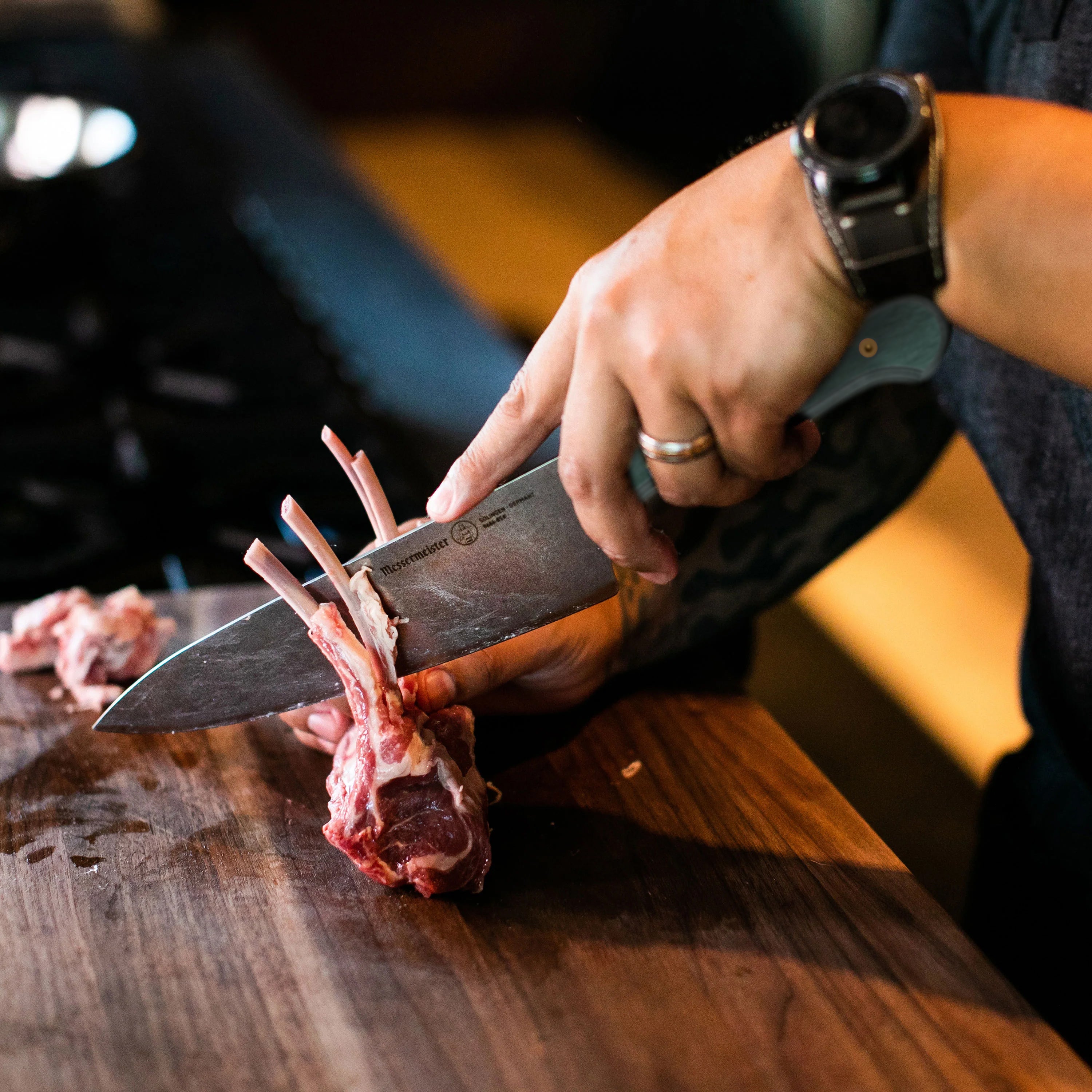 Ergonomic Pakkawood handle on the 8-inch kitchen knife for comfortable grip