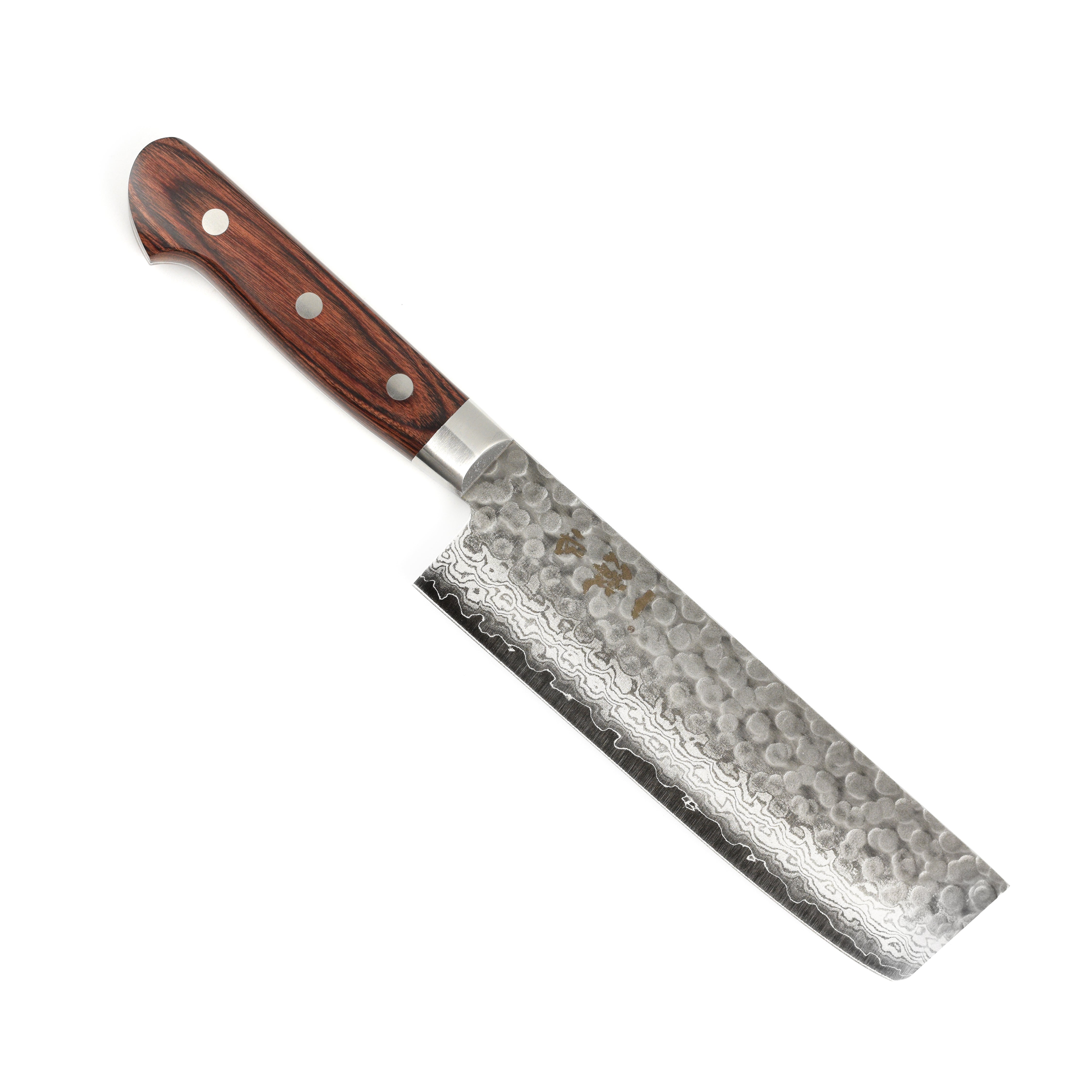 Close-up of the edge of the nakiri knife demonstrating its cutting precision.