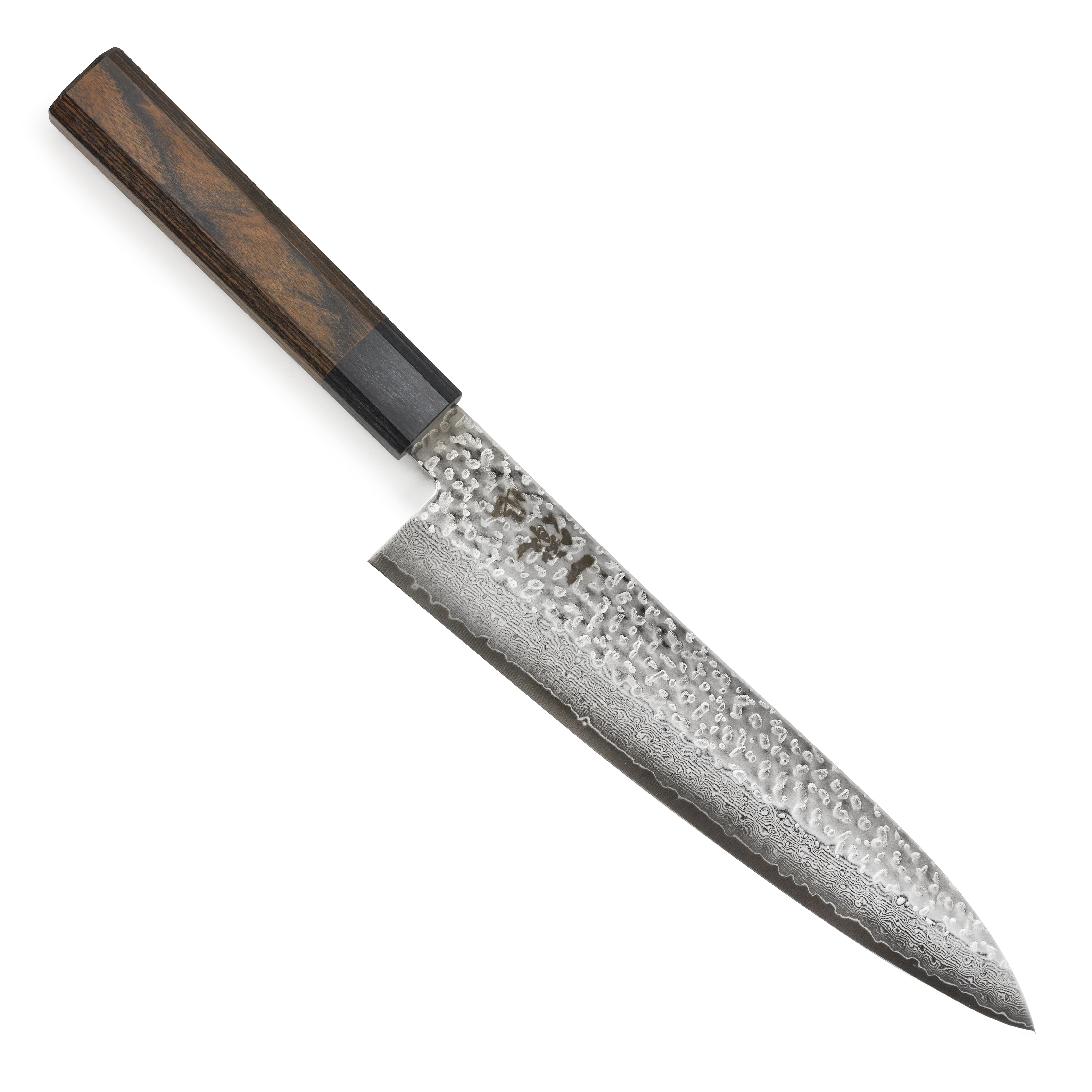 Close-up of the Ittetsu VG10 Damascus Gyuto blade showing hammered finish and VG10 steel core