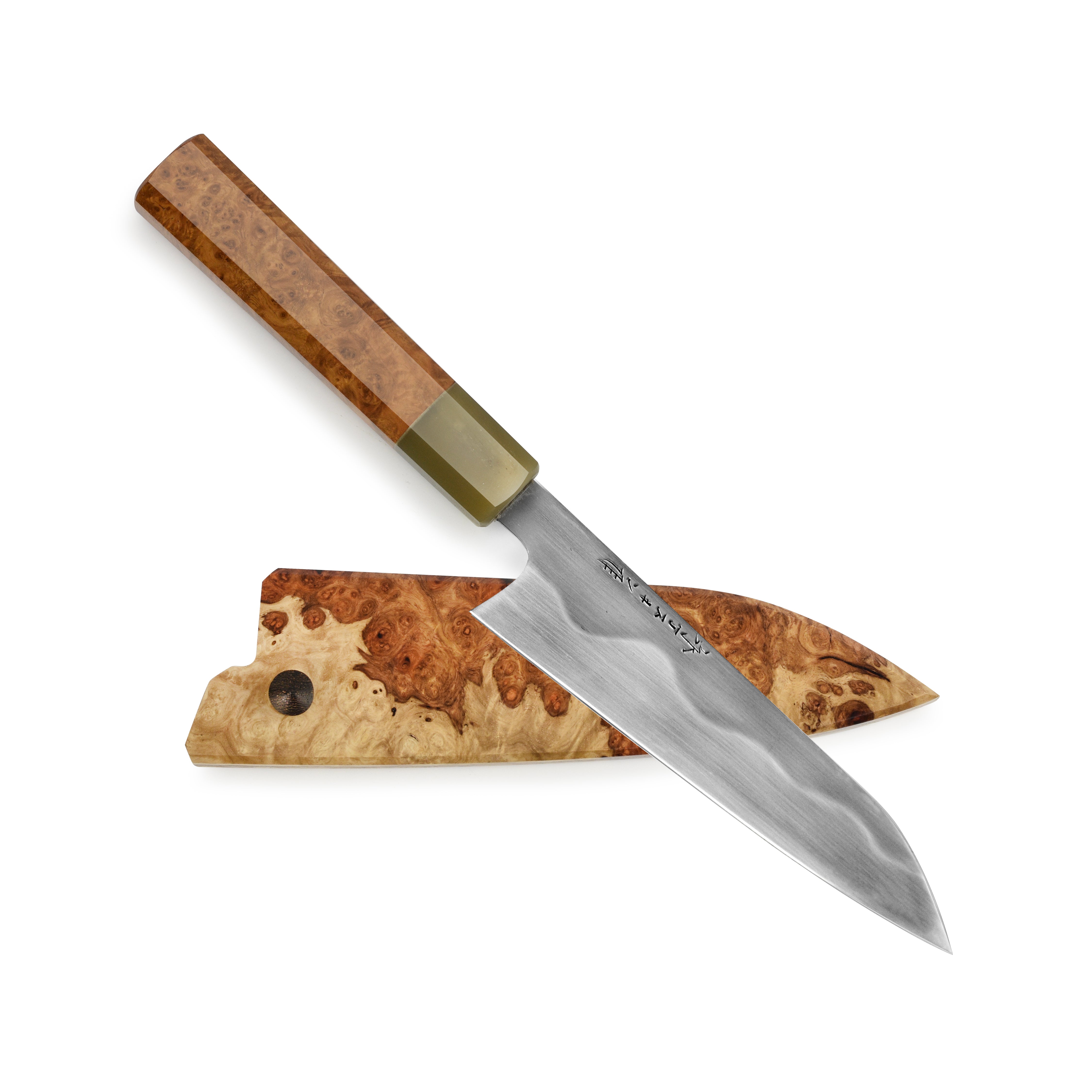 Precision cutting with the top-rated carbon steel kitchen knife, ideal for various culinary tasks.