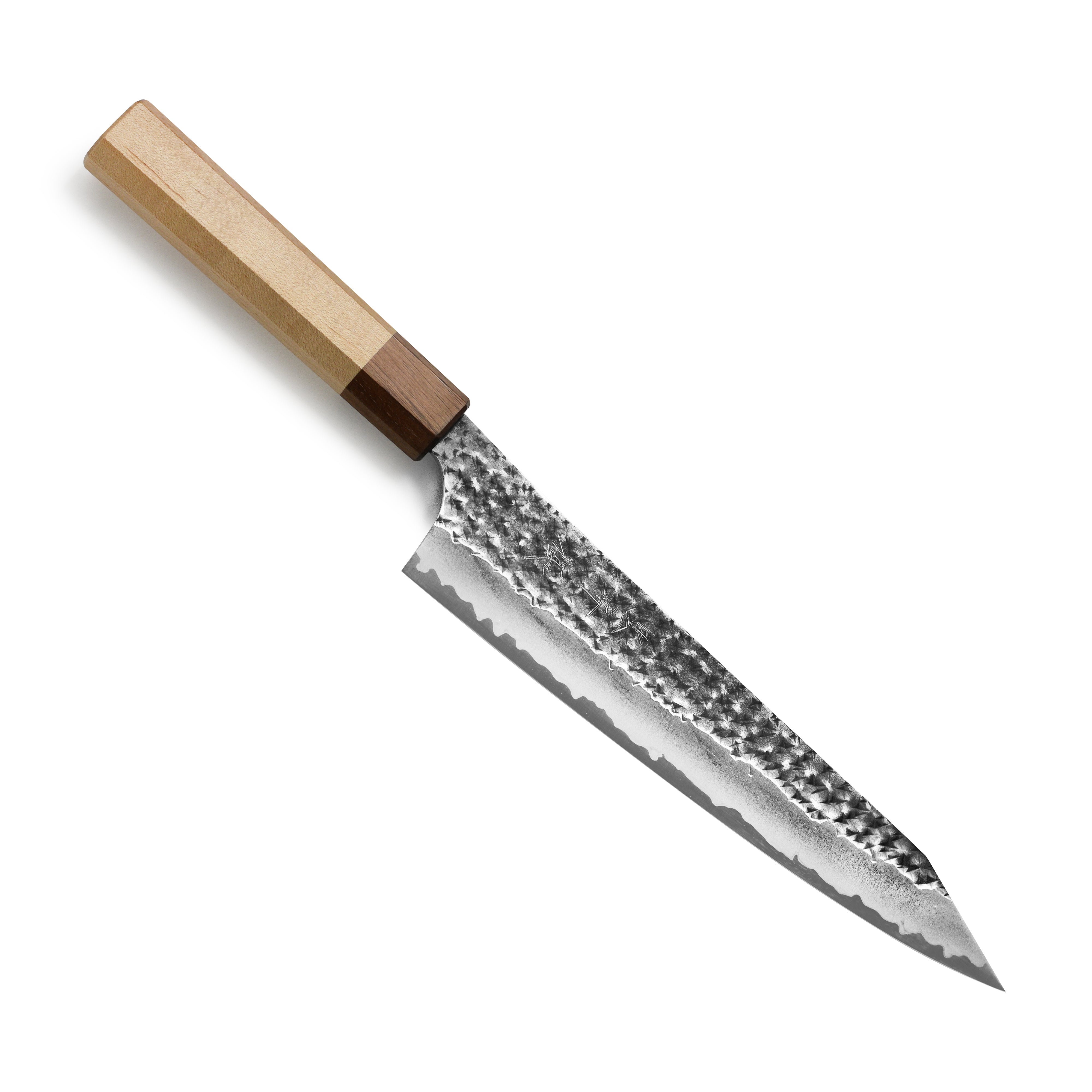 Professional chef using the Kurosaki Gyuto knife for precise vegetable slicing.