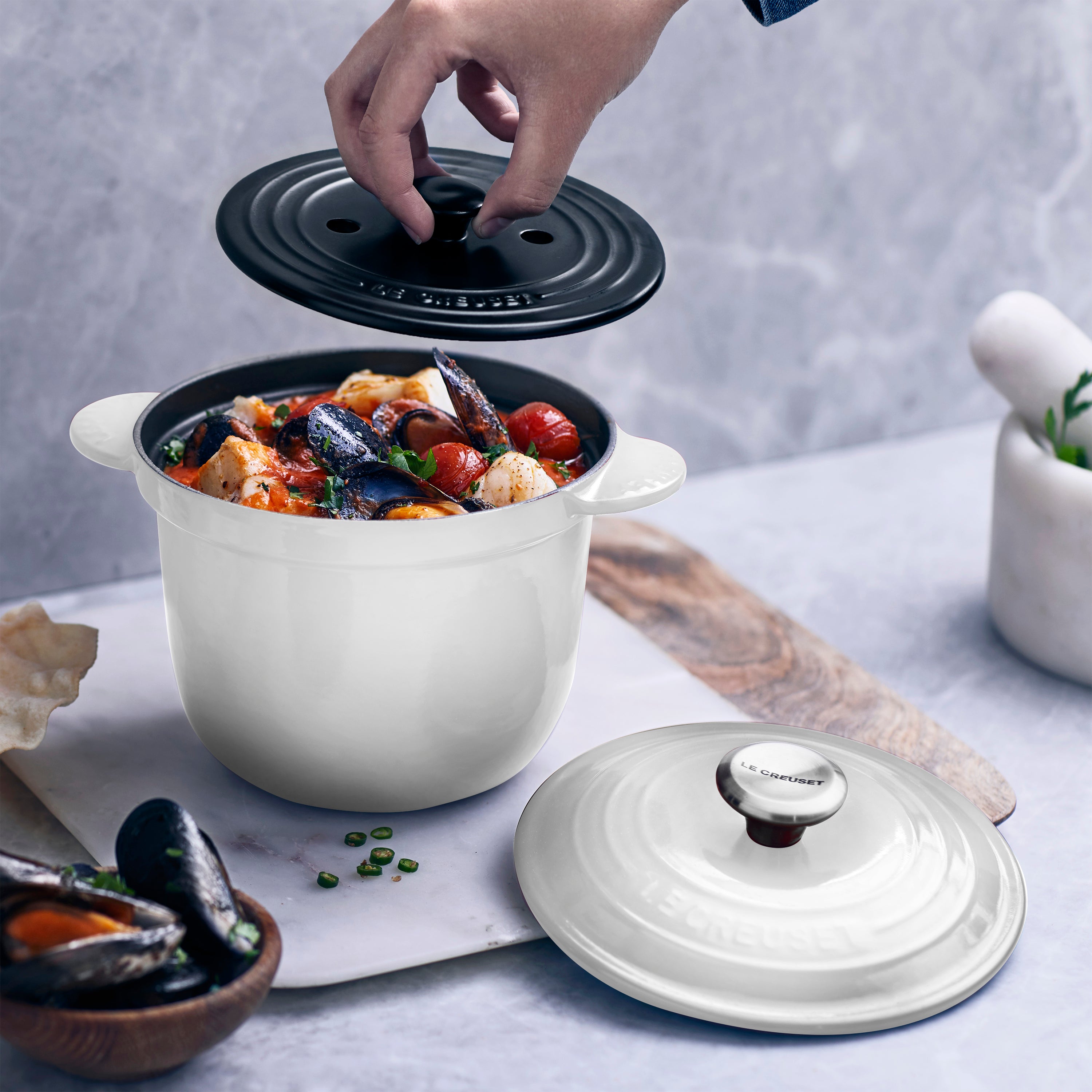 Close-up of the Le Creuset Cast Iron Rice Pot lid, highlighting the steam circulation feature.