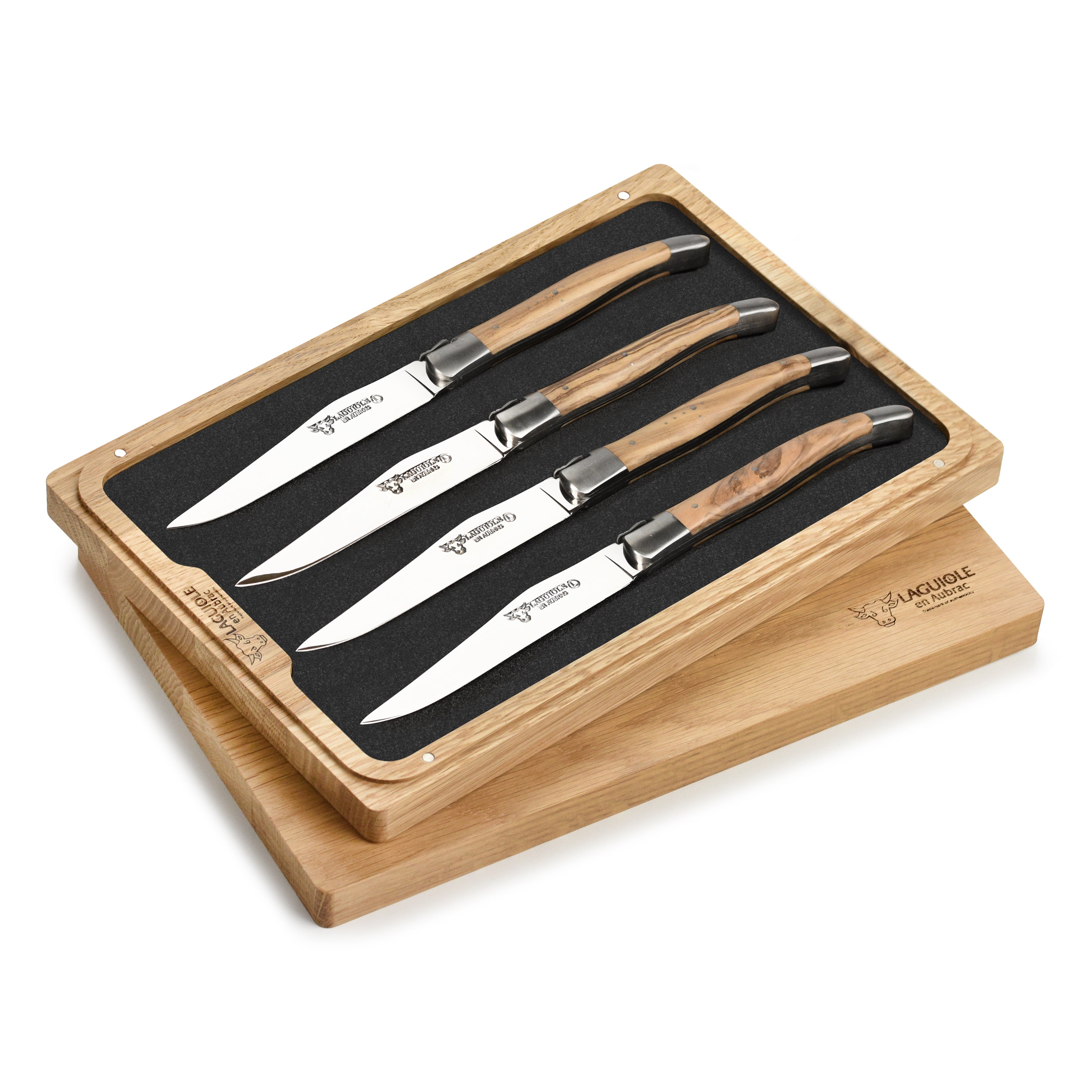 Close-up of olive wood handle on Laguiole steak knives showing craftsmanship