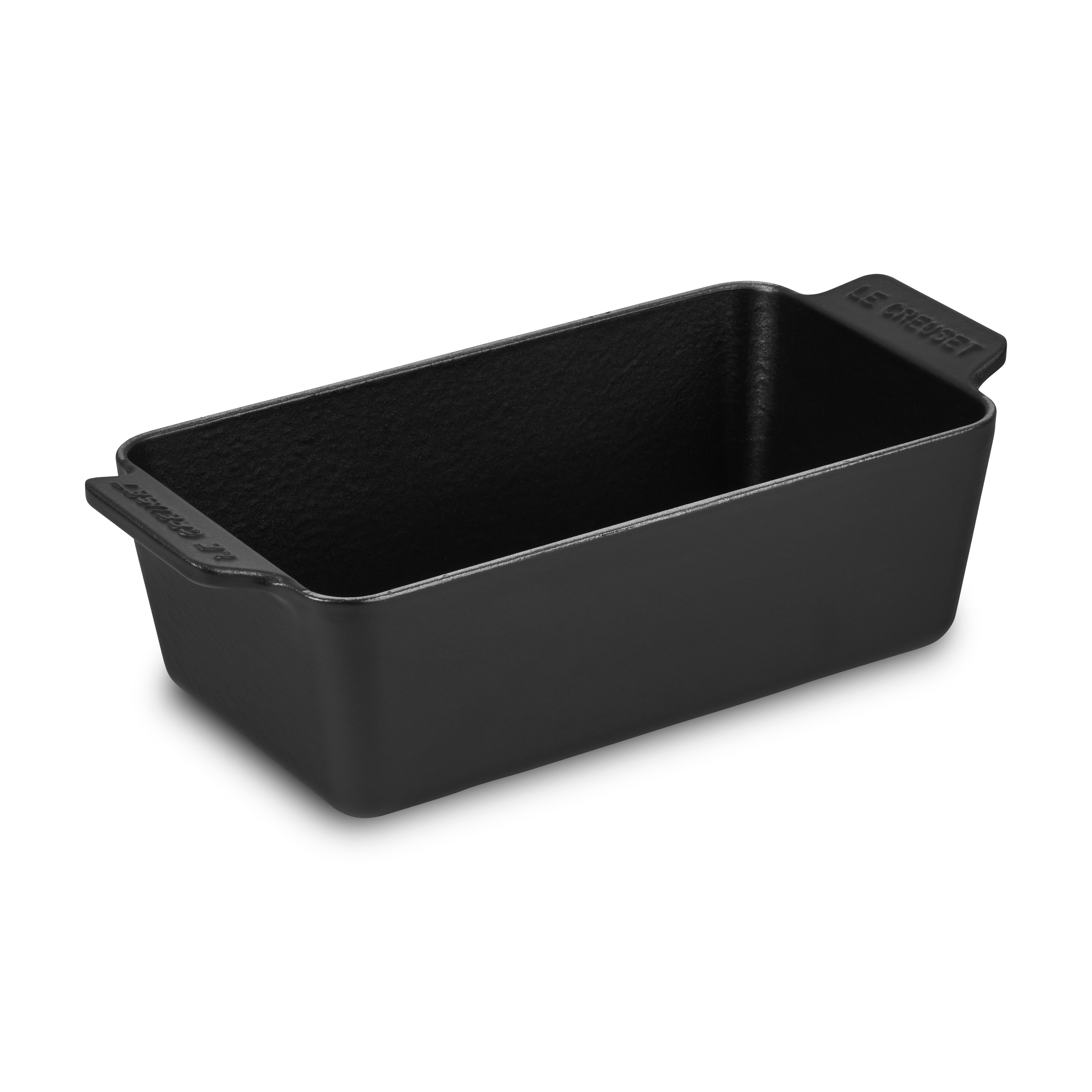 Close-up of Le Creuset cast iron loaf pan showing black satin interior enamel