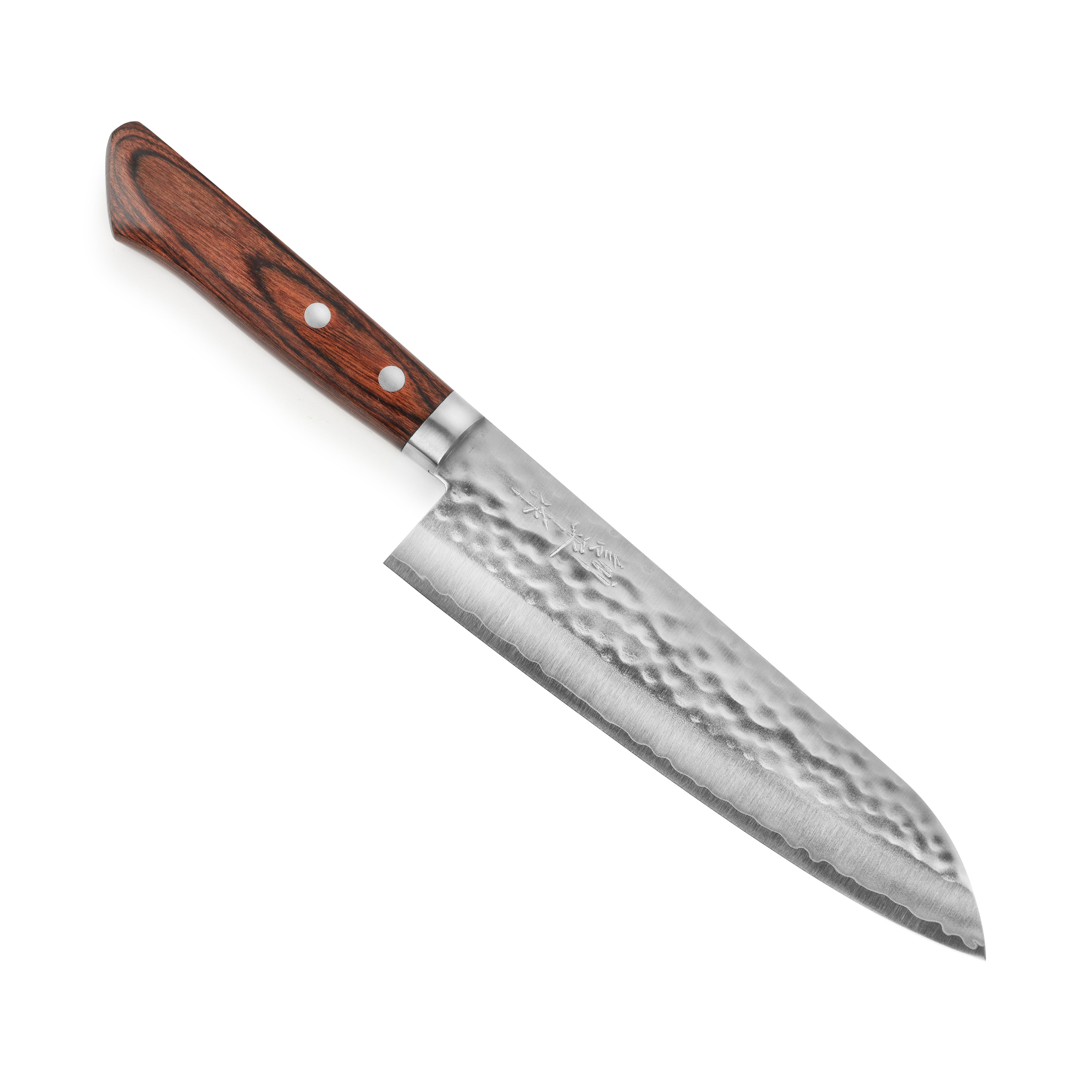 Close-up of the Masutani VG1 Gyuto knife showcasing the hammered finish and Pakkawood handle.