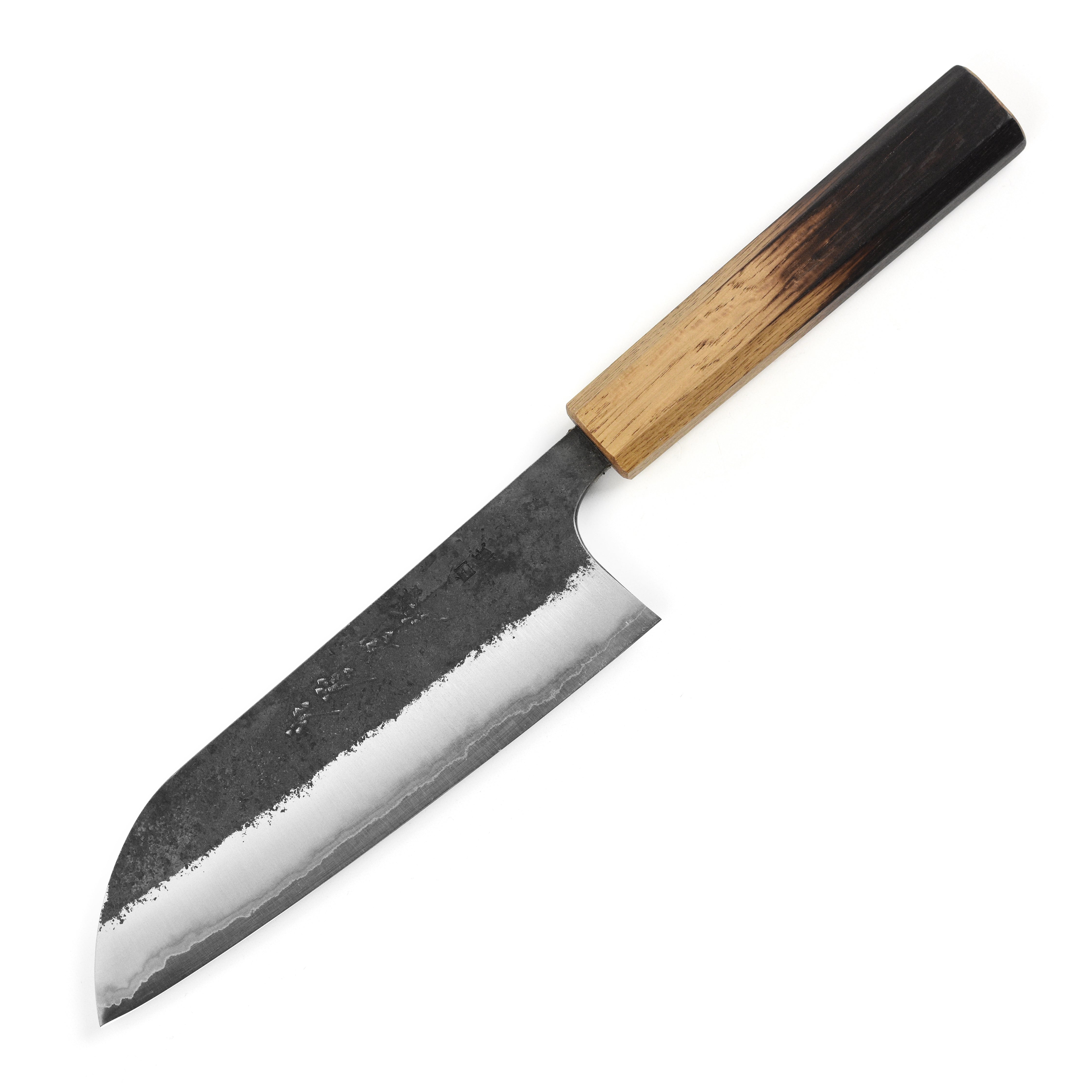 Chef preparing vegetables with a high-quality Japanese santoku knife