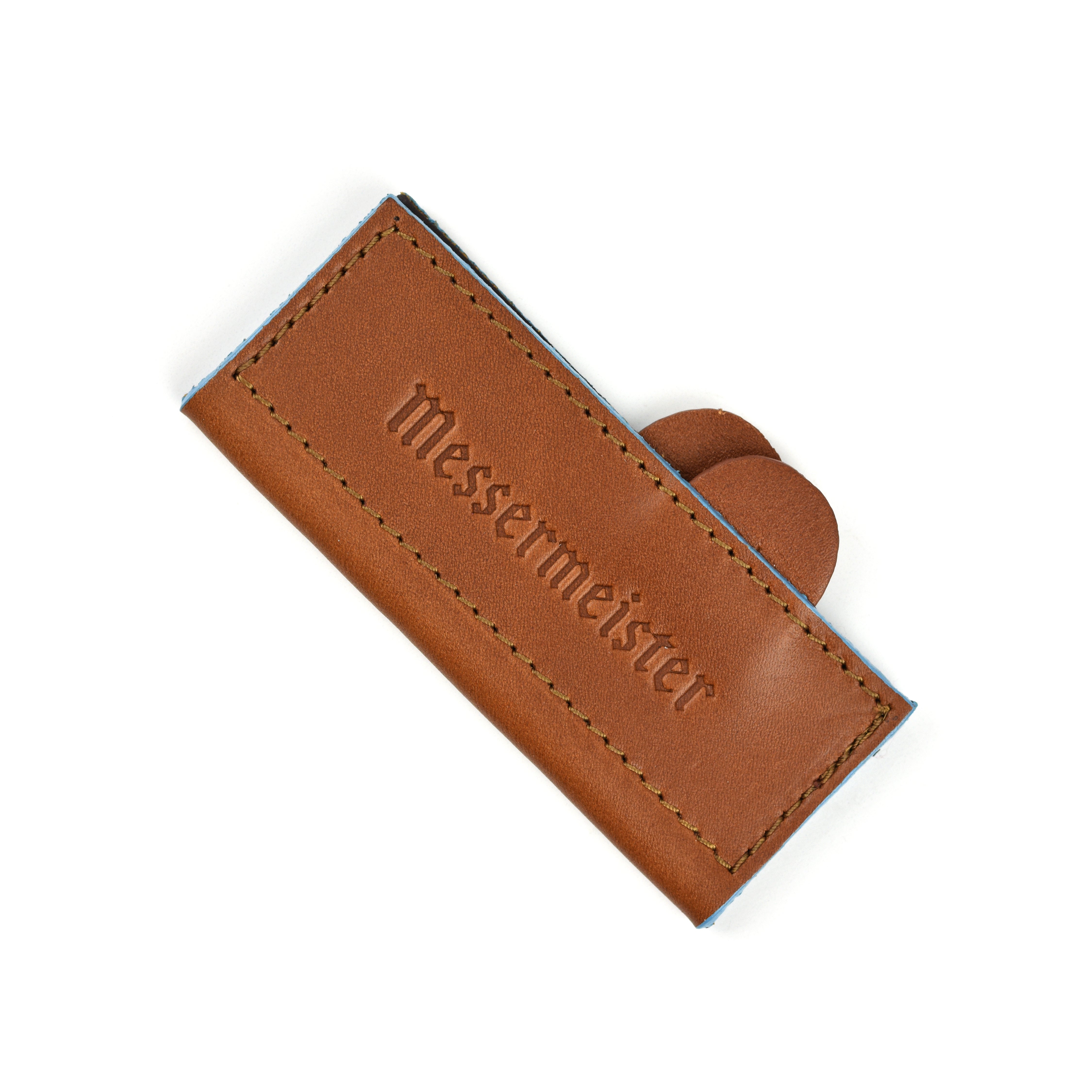 The leather knife sheath displayed with a 4 inch knife secured inside, highlighting its fit.