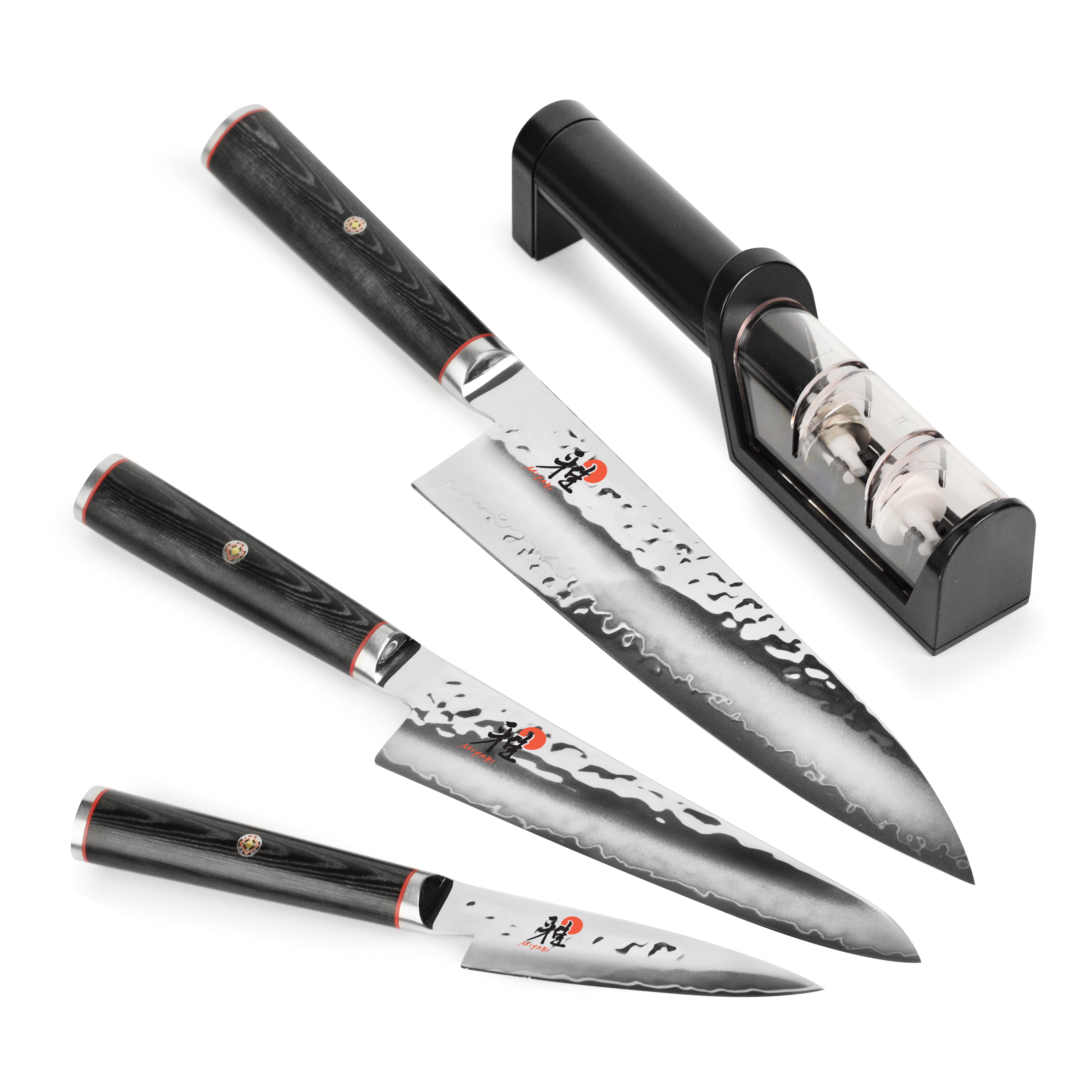 Miyabi Mizu SG2 knife set showcasing the elegant Damascus steel blades and Micarta handle from a side angle.