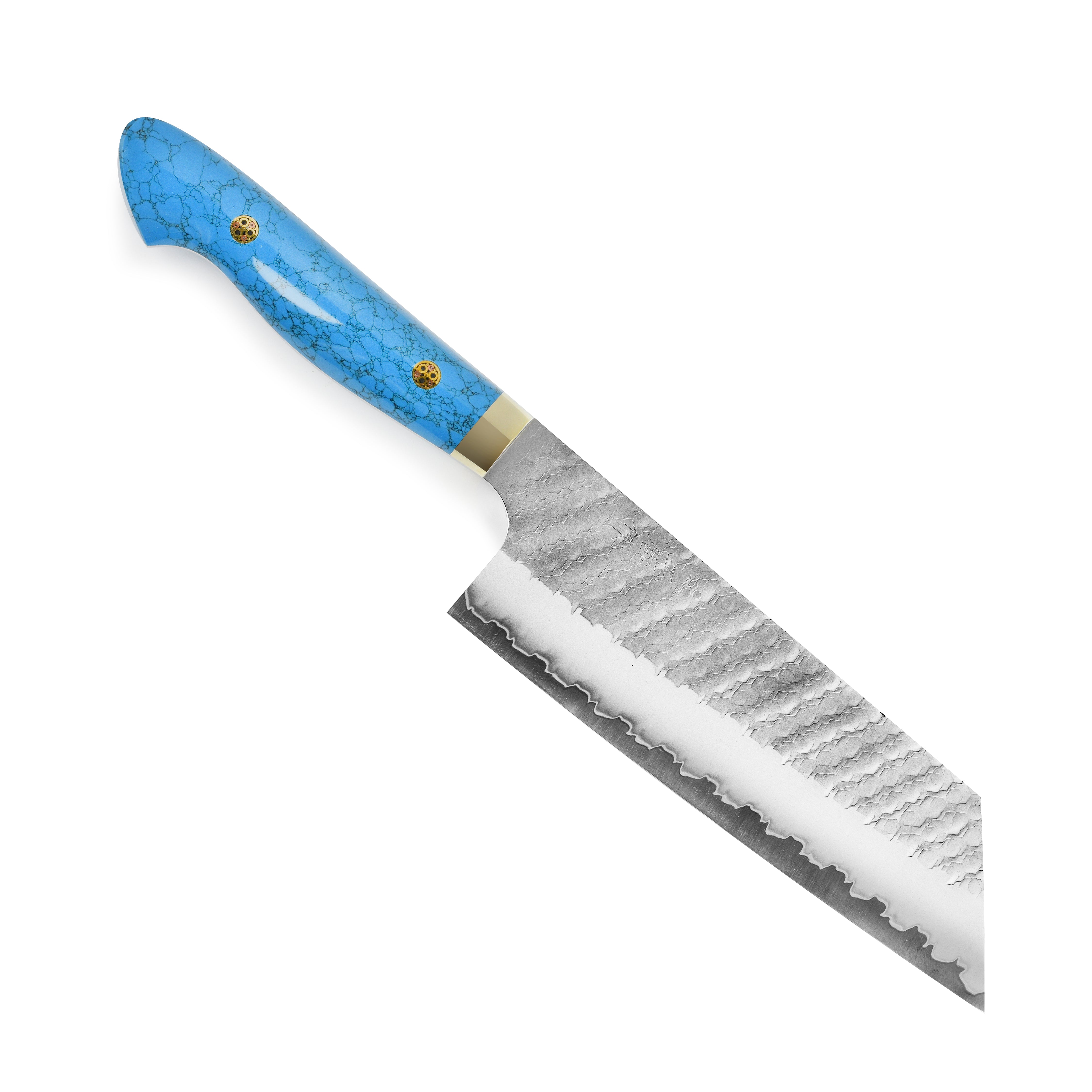 Nigara SG2 Kiritsuke knife on a wooden cutting board, demonstrating its use in a cooking environment.