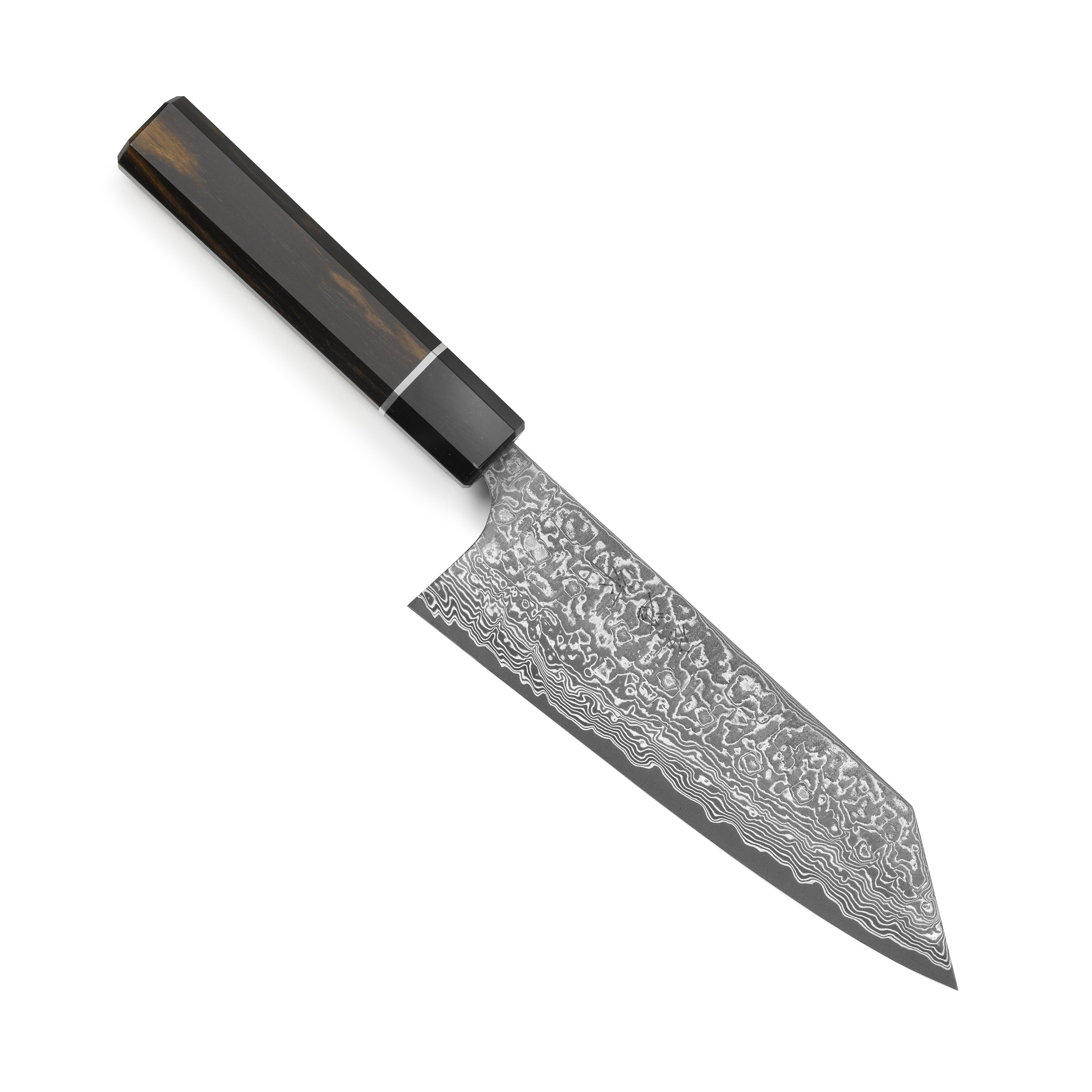 Japanese handmade kitchen knife with ebony handle on wooden table
