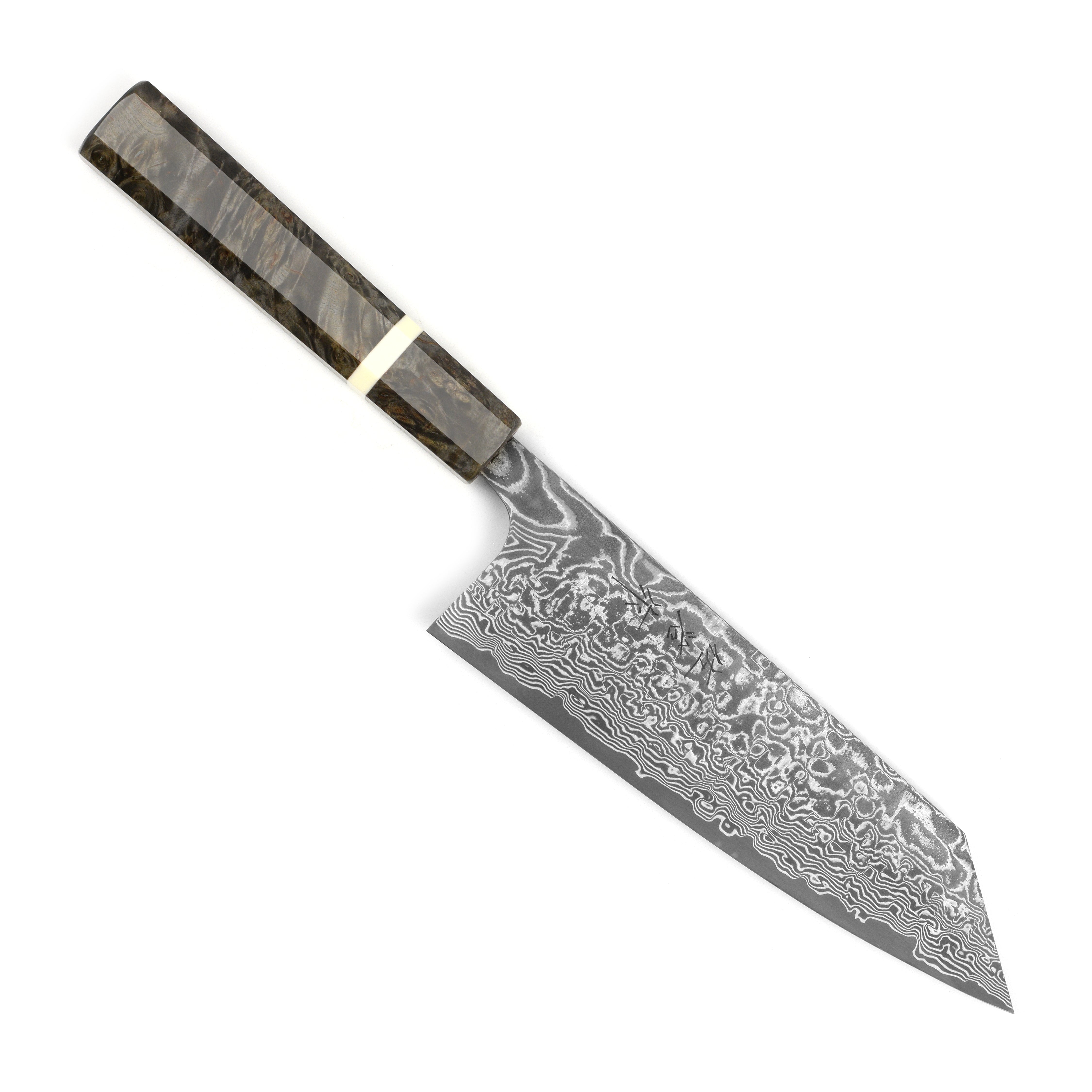Close-up of the SG2 Damascus steel blade showcasing its fine edge and stunning dark finish.