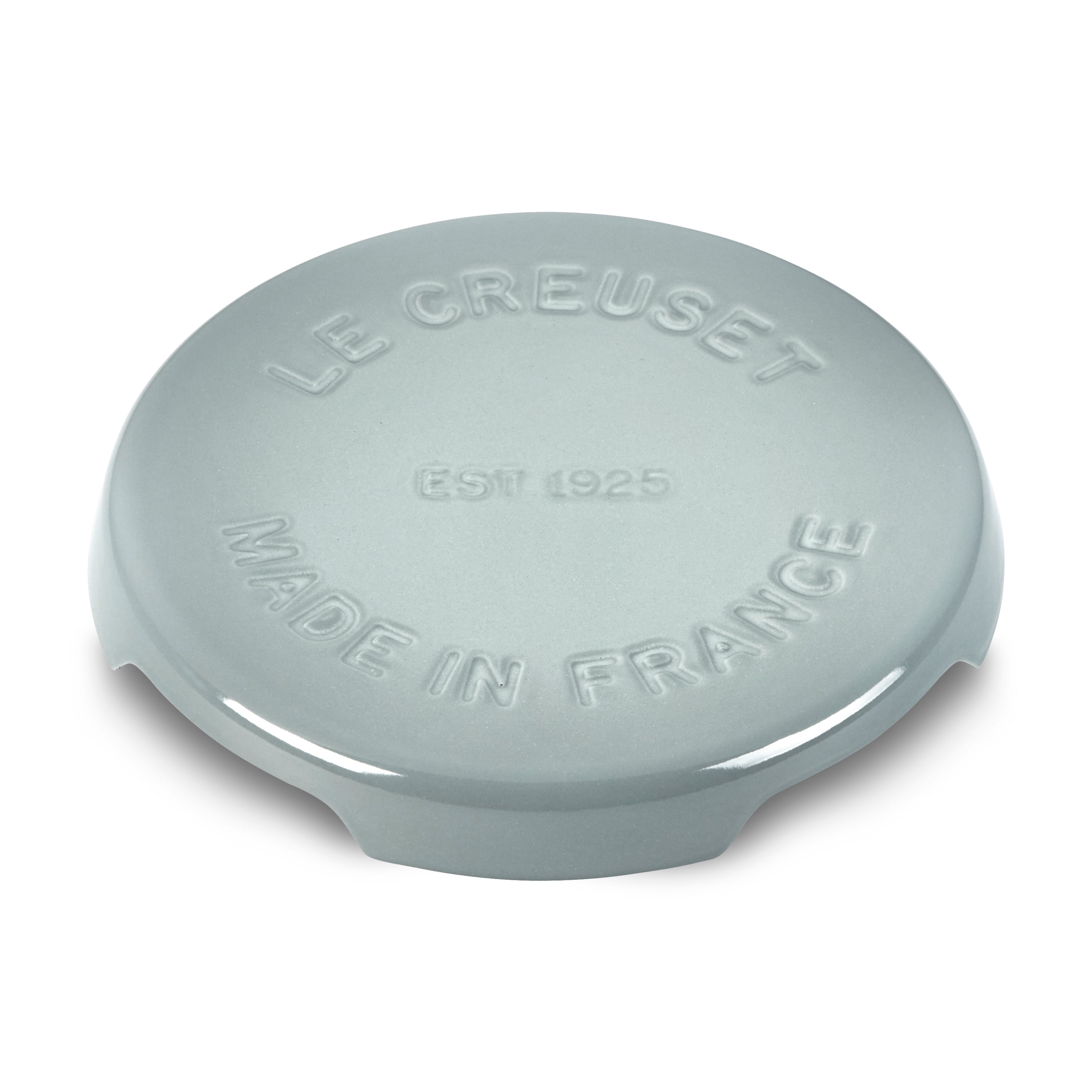Le Creuset round trivet showcasing elevated design and enamel finish