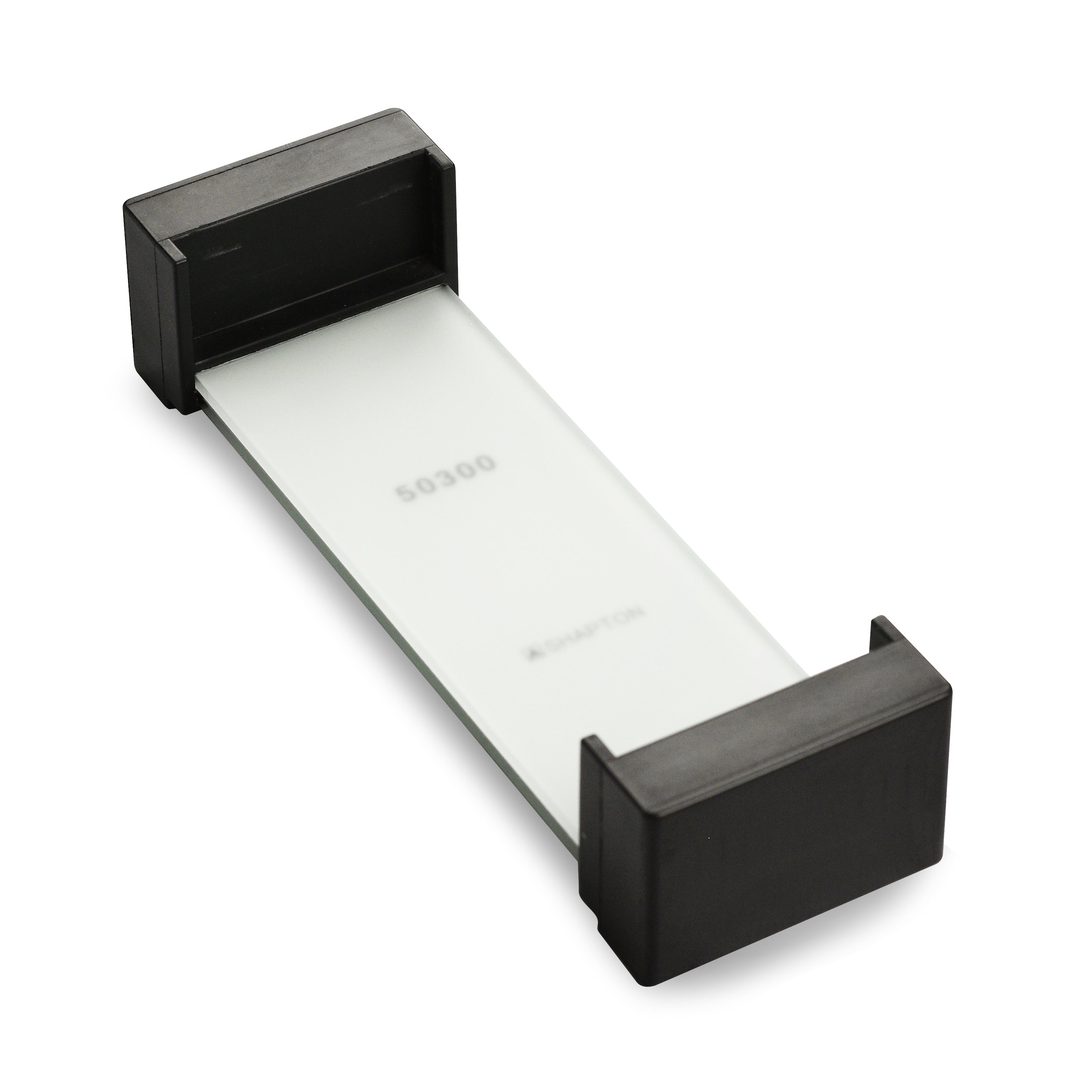 Shapton Glass Stone Holder holding multiple sharpening stones on a kitchen counter