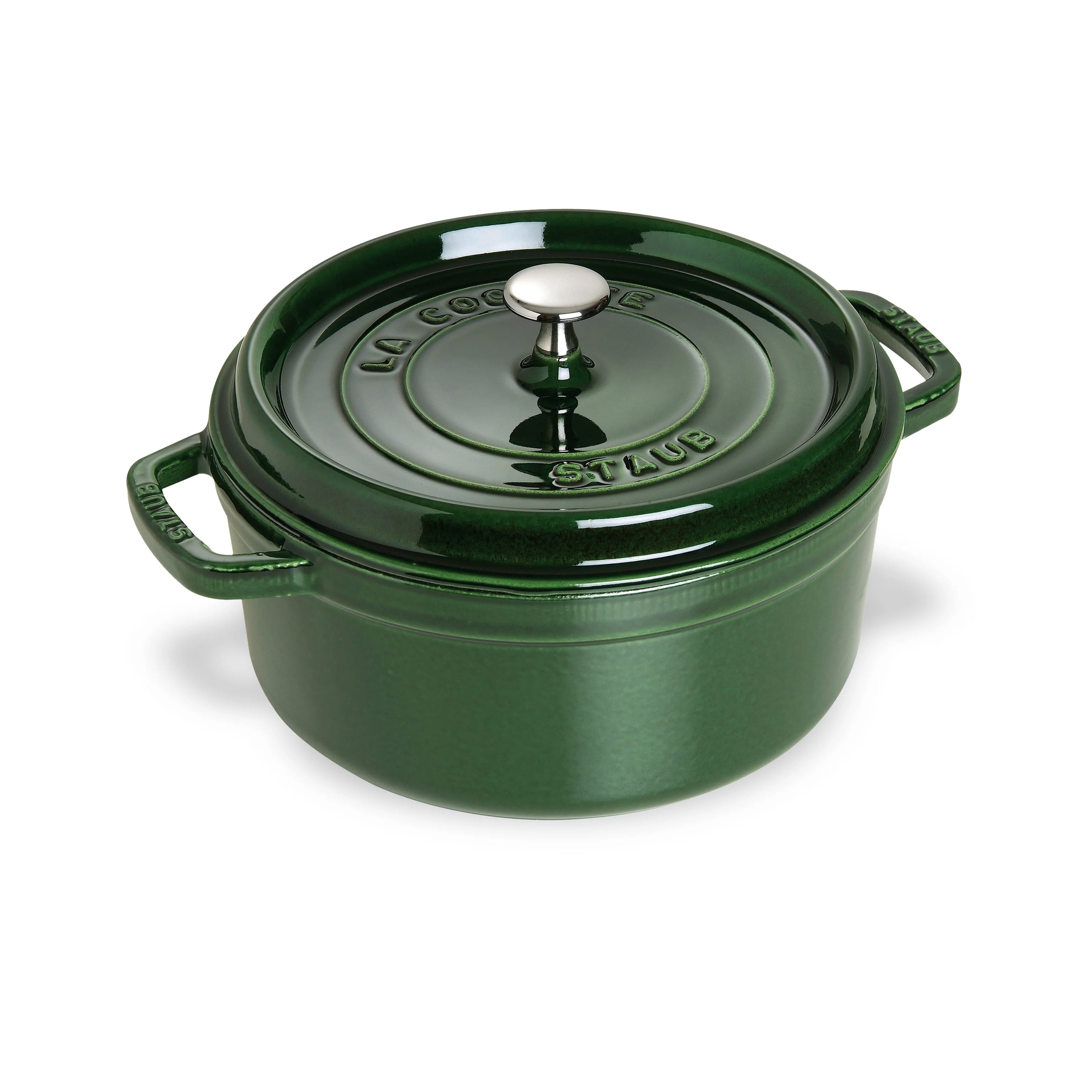 Close-up of Staub 4-quart round Dutch oven showcasing its basil color and textured enamel interior.