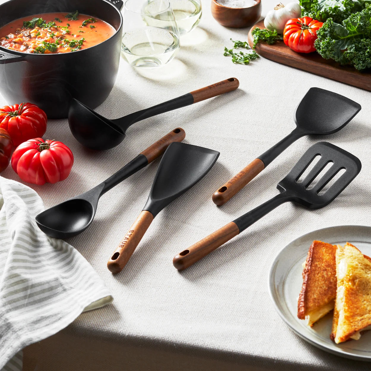Close-up of durable silicone cooking tools in use, showcasing the unique design and functionality.