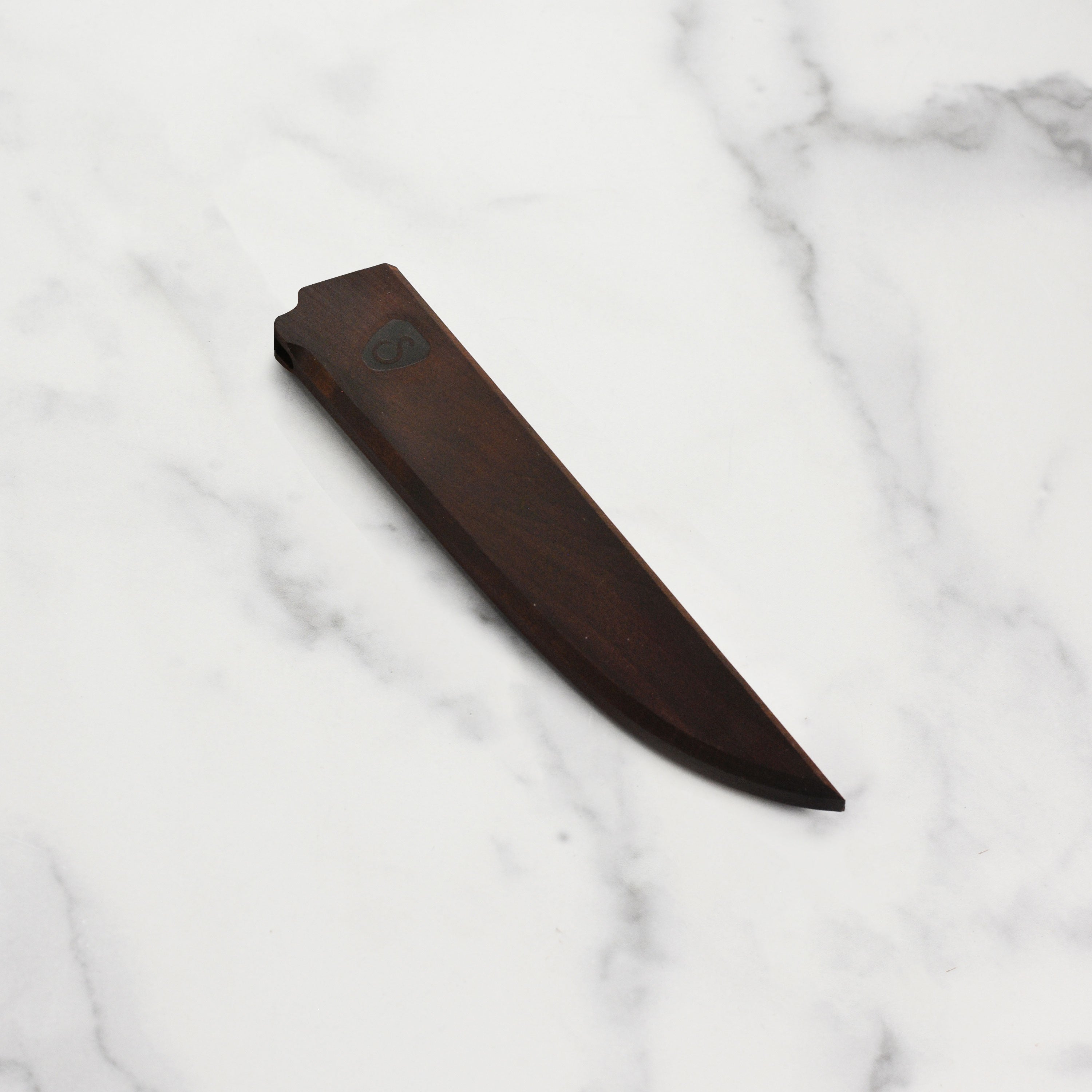 Oregon maple magnetic knife sheath showcasing a 6 inch boning knife securely held in place.