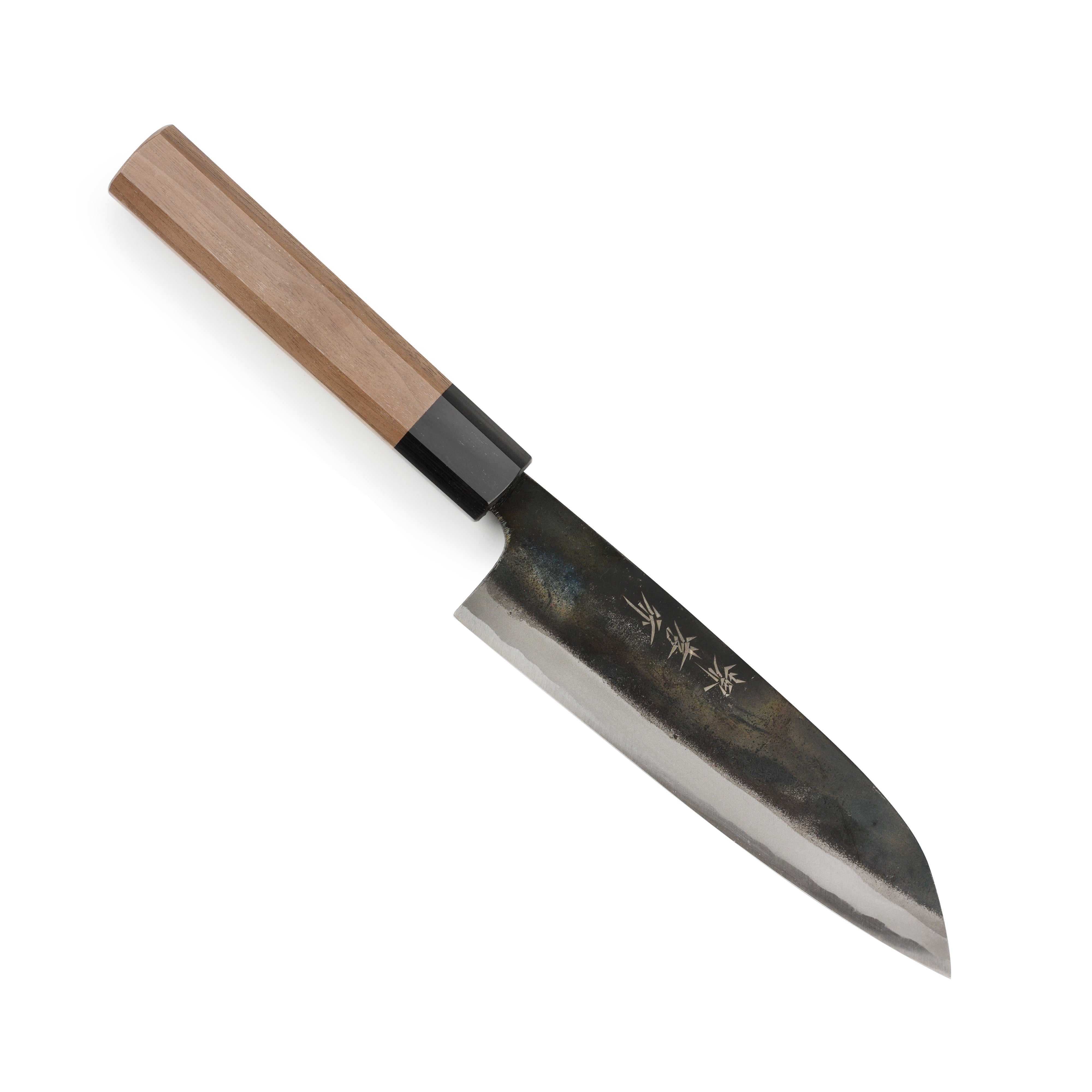 Close-up of the Aogami Kurouchi 6.7-inch Santoku knife blade showing kurouchi finish