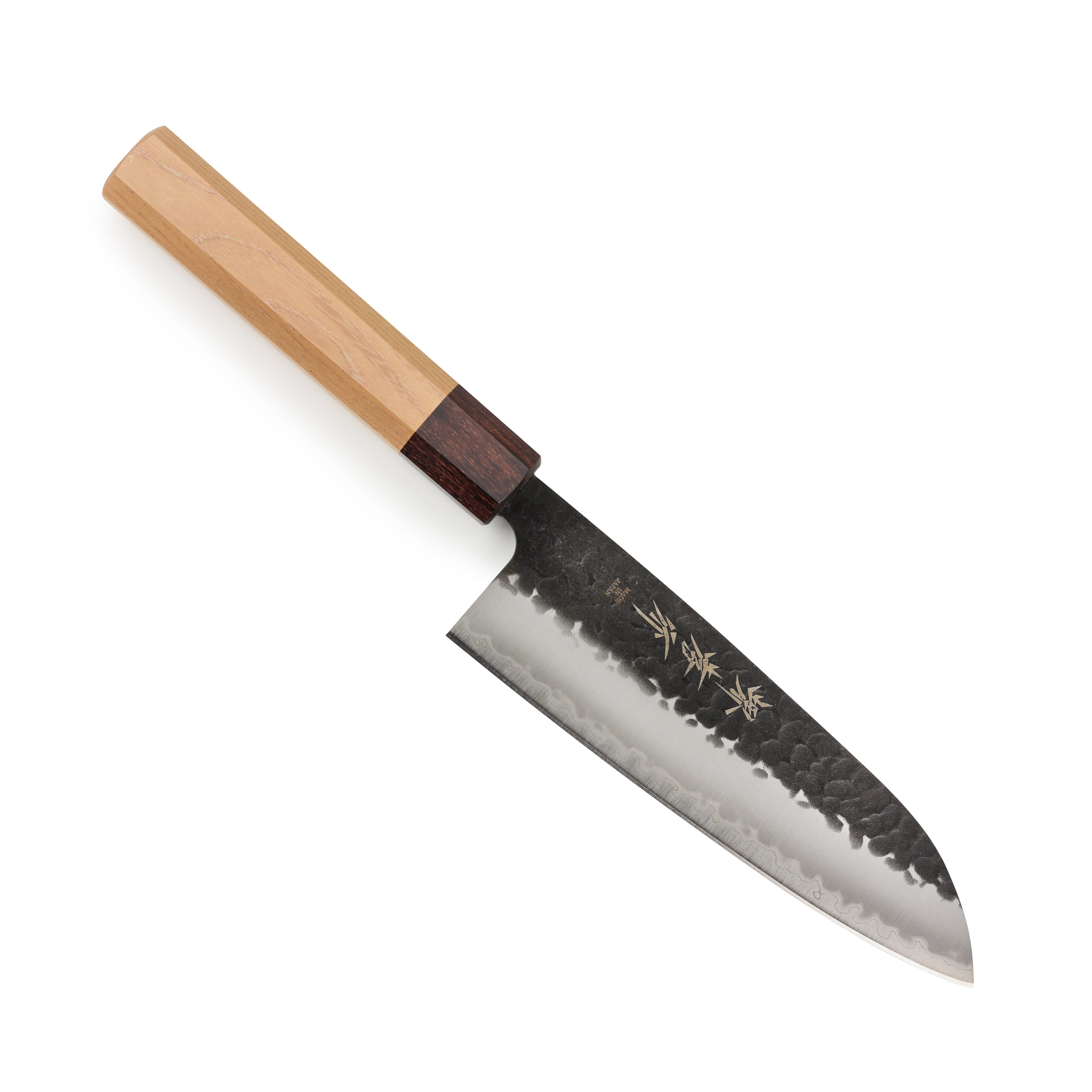 Close-up of Takayuki Aogami Super Santoku knife blade with kurouchi finish