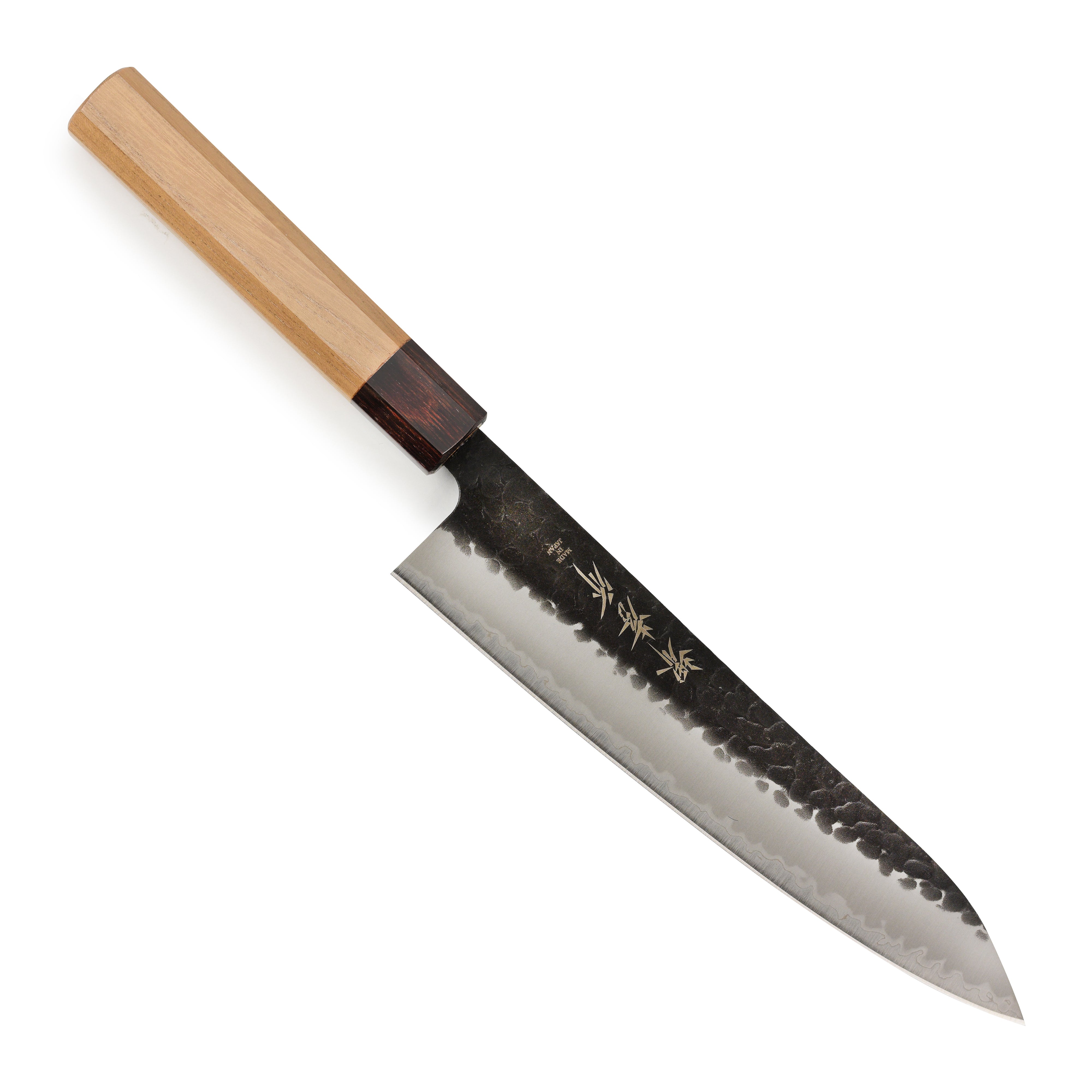 Takayuki Aogami Gyuto knife showcasing its blue carbon steel blade and wooden handle from a side angle.