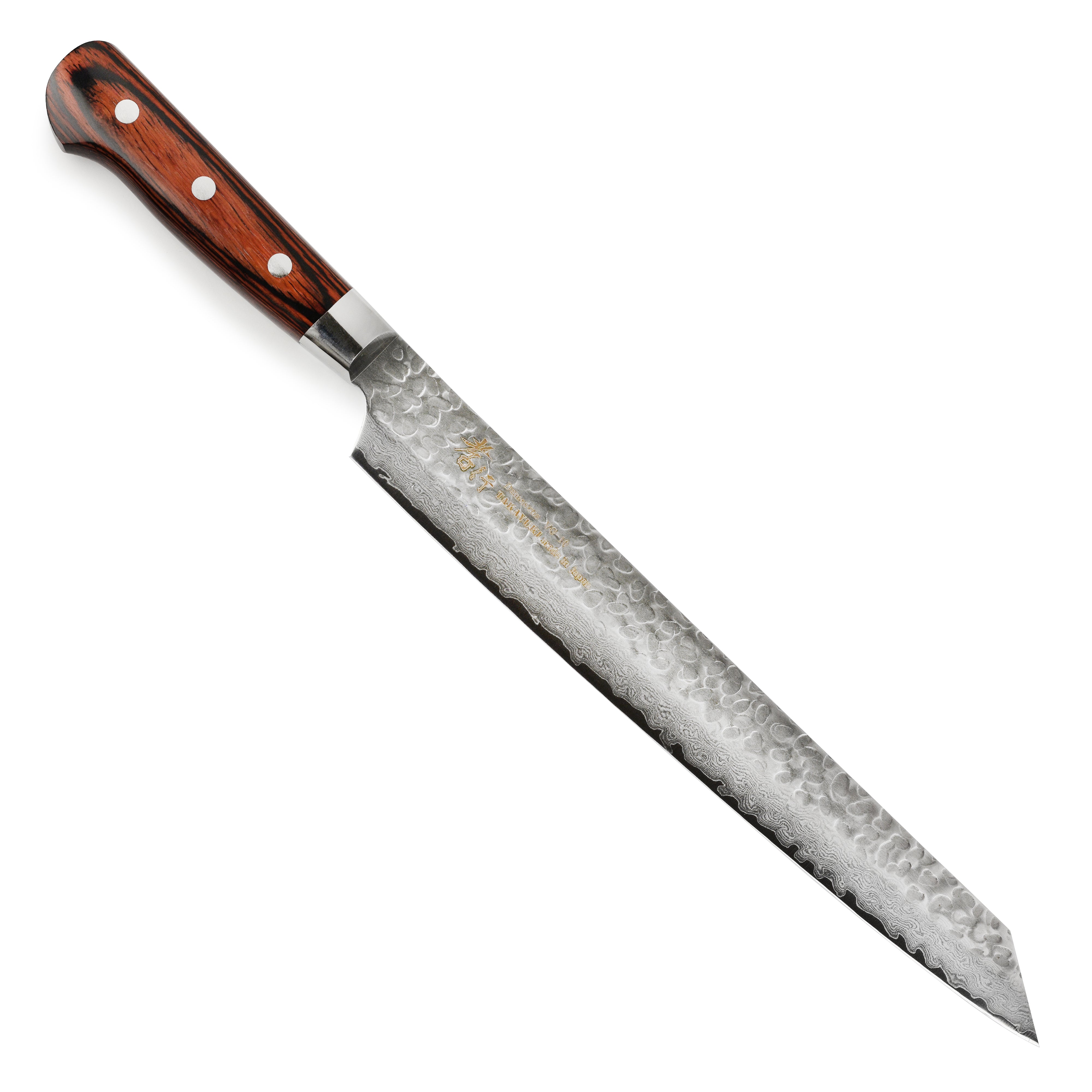Sakai Takayuki Hammered Damascus Knife on a wooden cutting board, showcasing its sleek design.