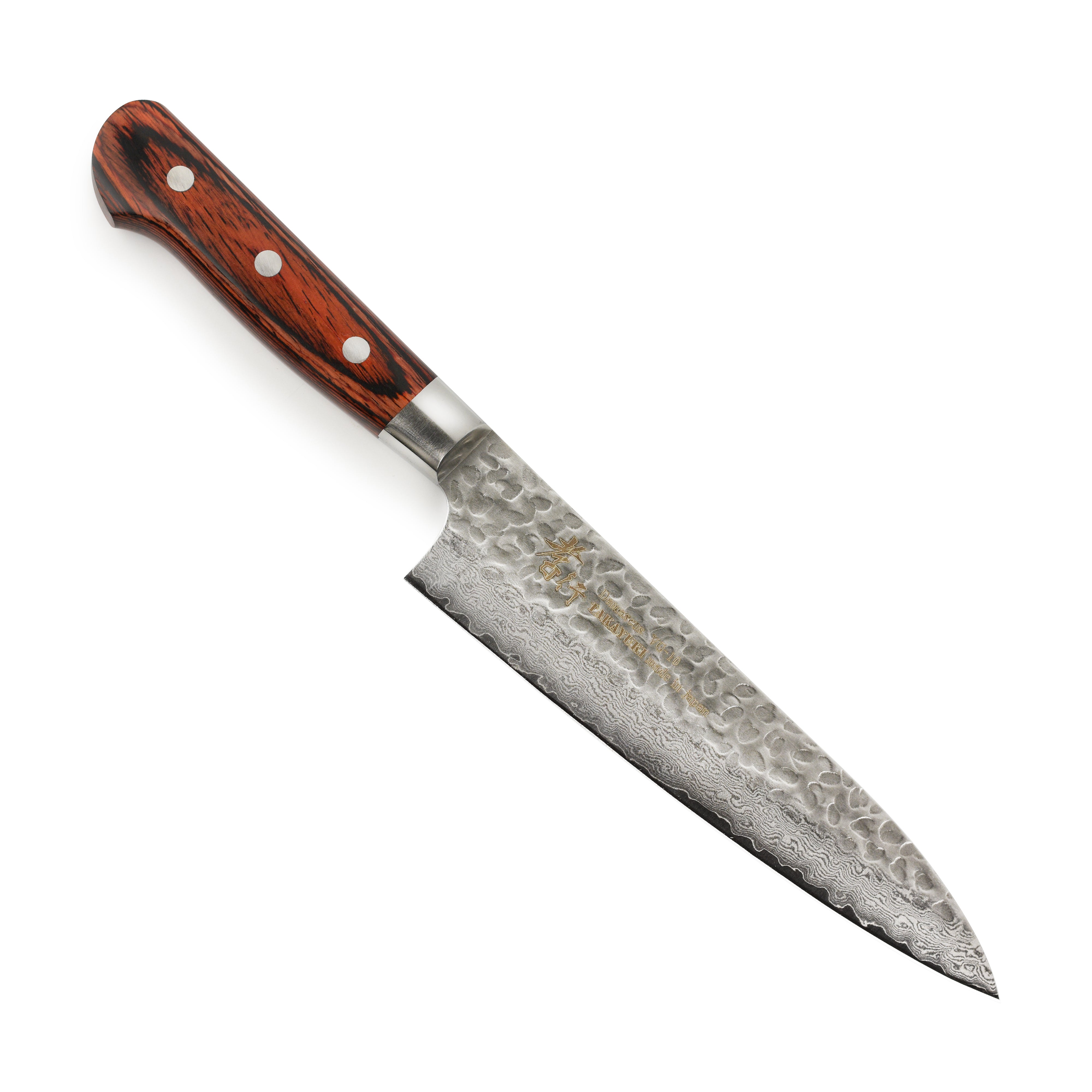 Close-up of the Sakai Master Hammered Damascus Gyuto Chef Knife blade highlighting the 33-layer structure.