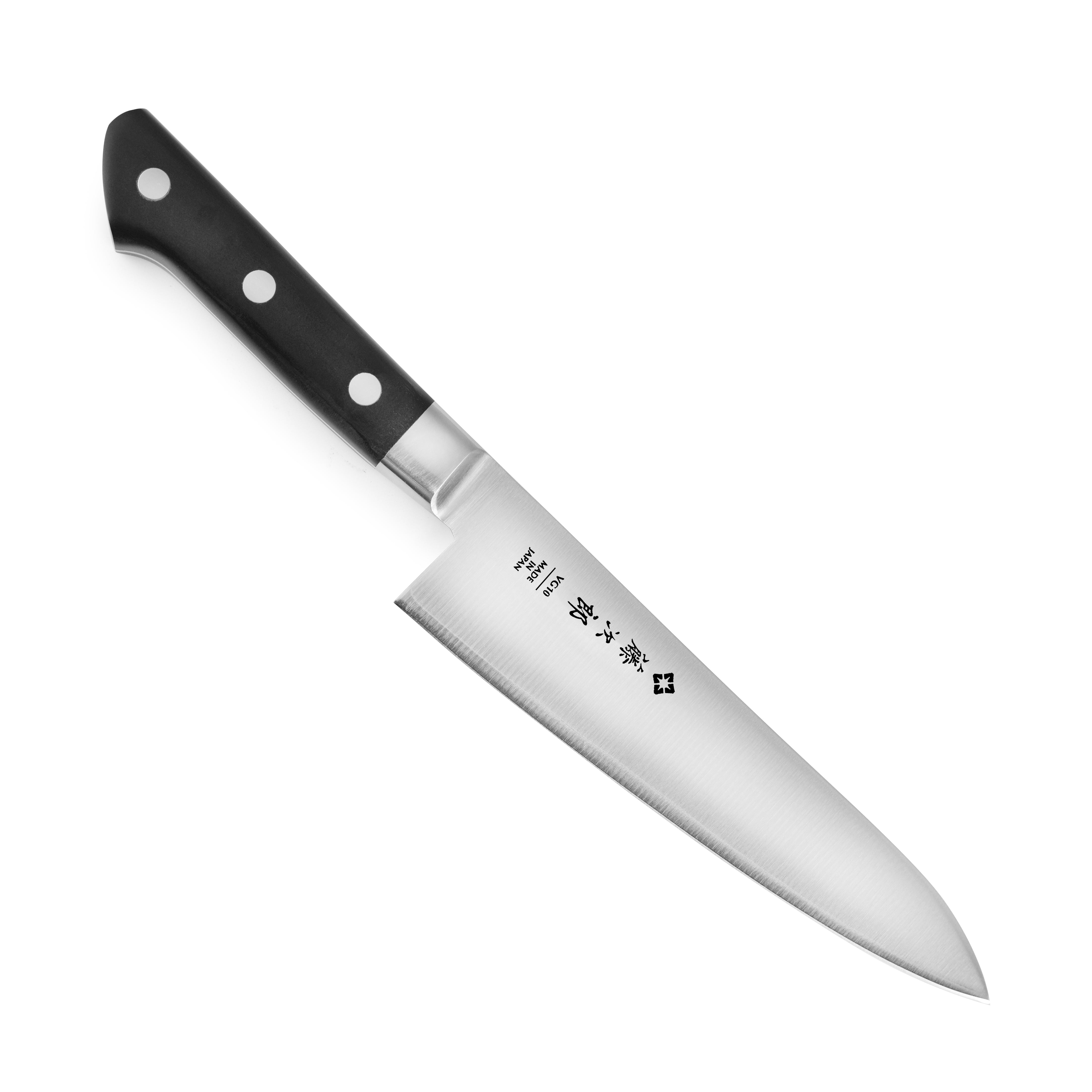 Close-up of Tojiro Classic 7-inch chefs knife on a wooden cutting board, showcasing the VG-10 steel blade and micarta handle.