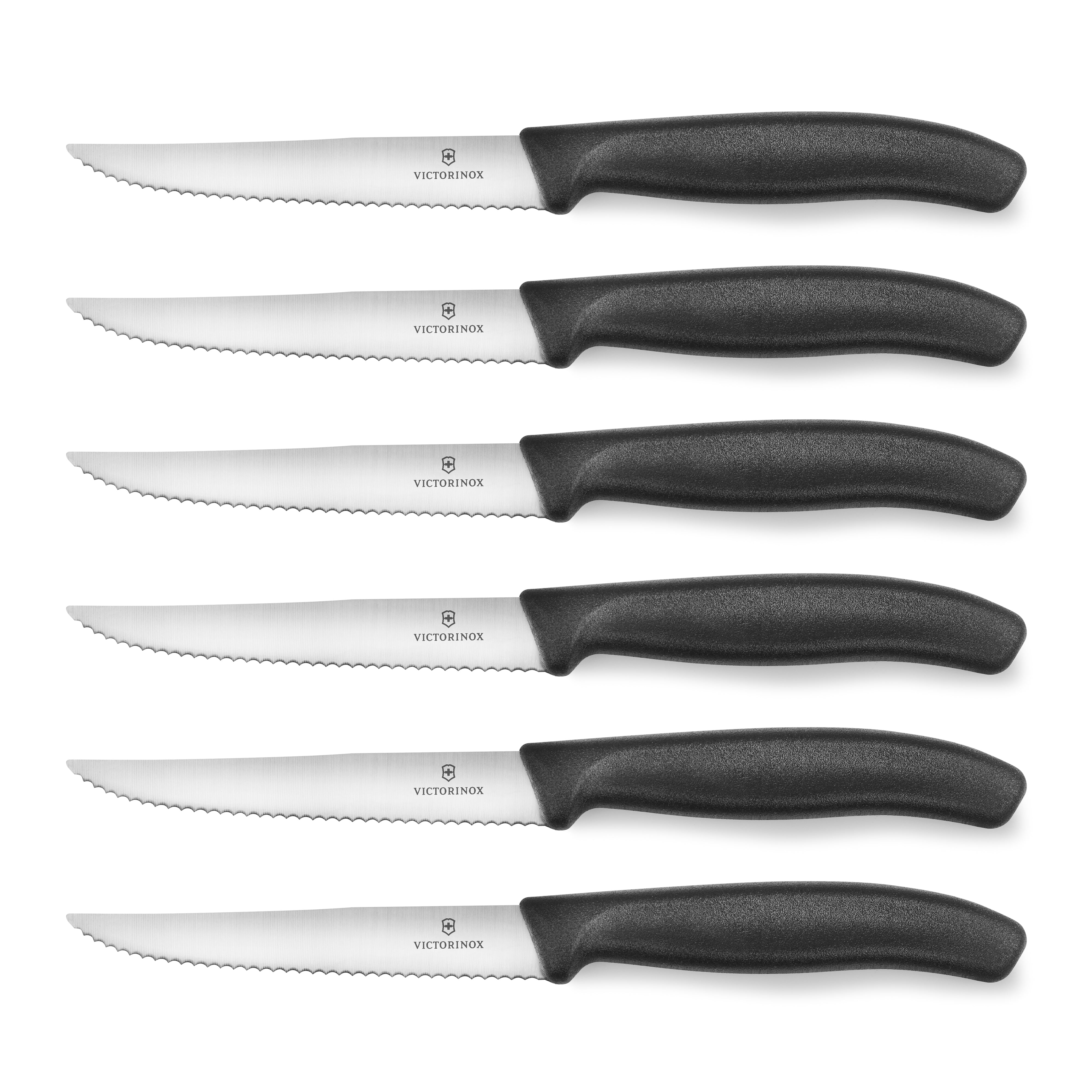 Close-up of the serrated blade edge from the Victorinox steak knife set, highlighting stainless steel finish.
