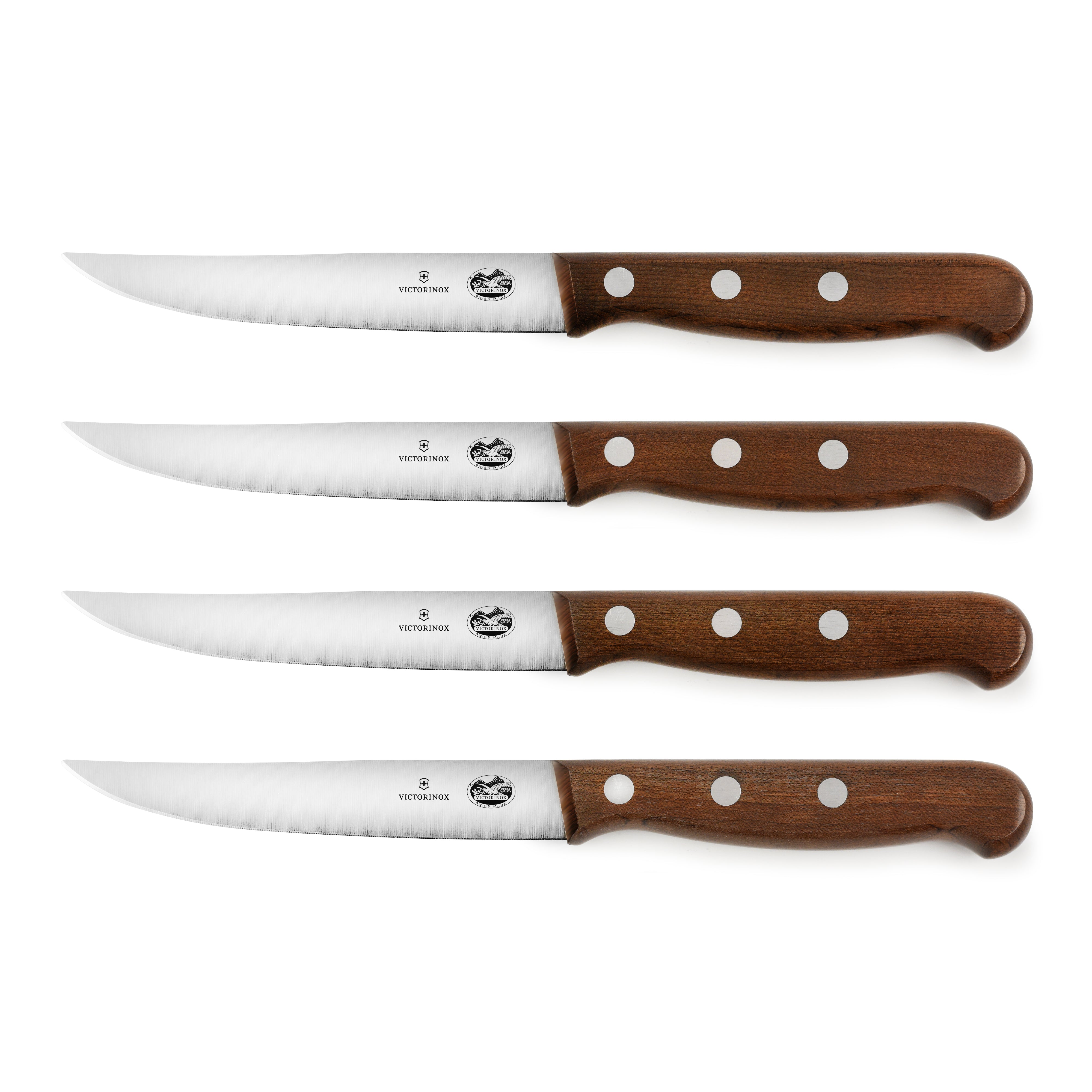 Close-up of Victorinox steak knives showing the tapered blade and ergonomic handles