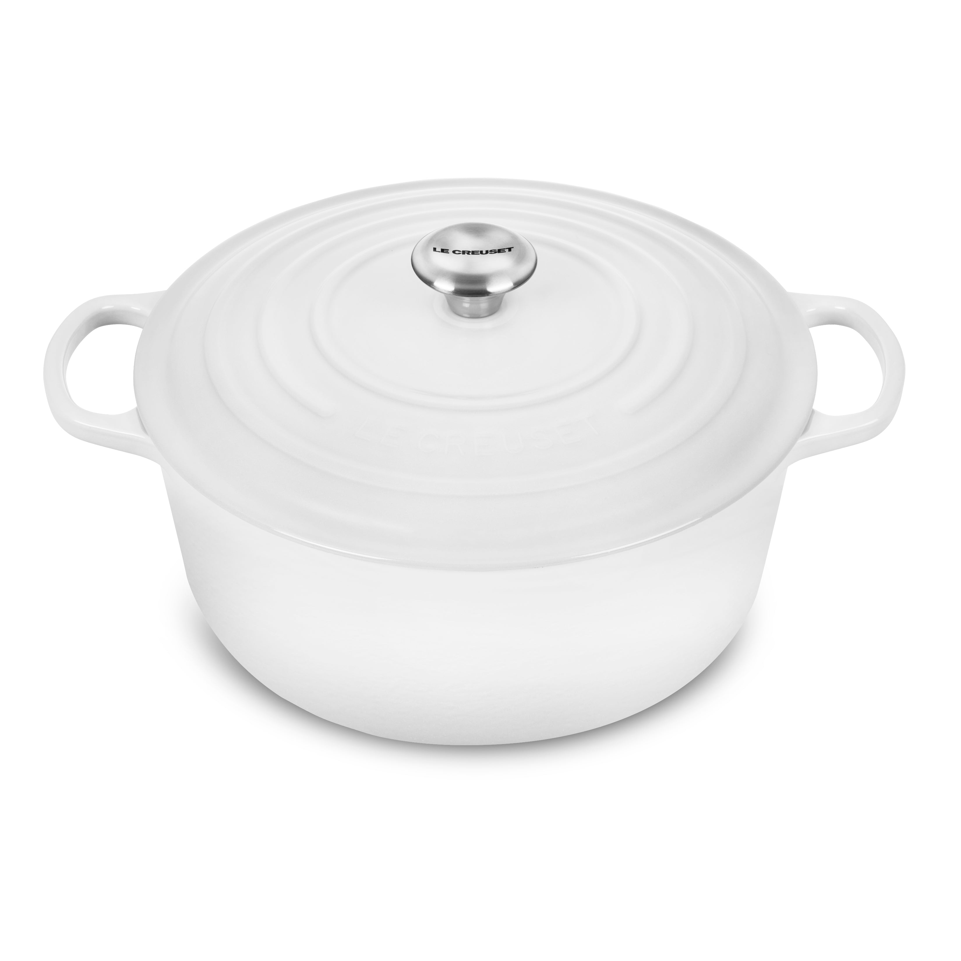 Top-down view of the Le Creuset 9QT white dutch oven showing ergonomic knob and lid design