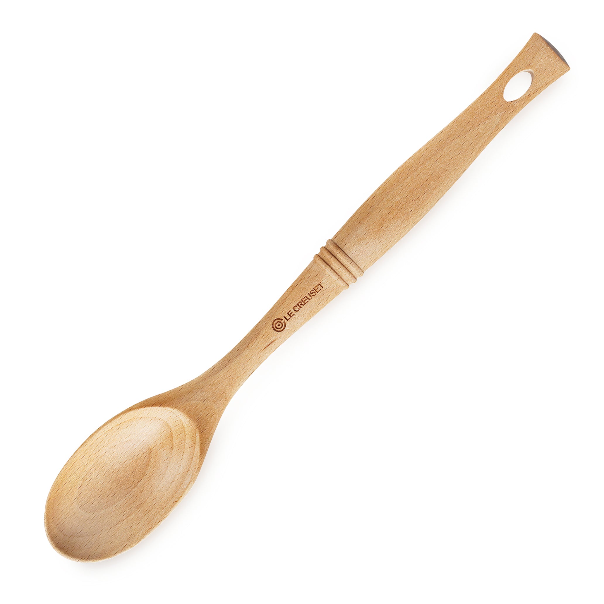Close-up of premium beechwood kitchen spoon showing ergonomic handle design.