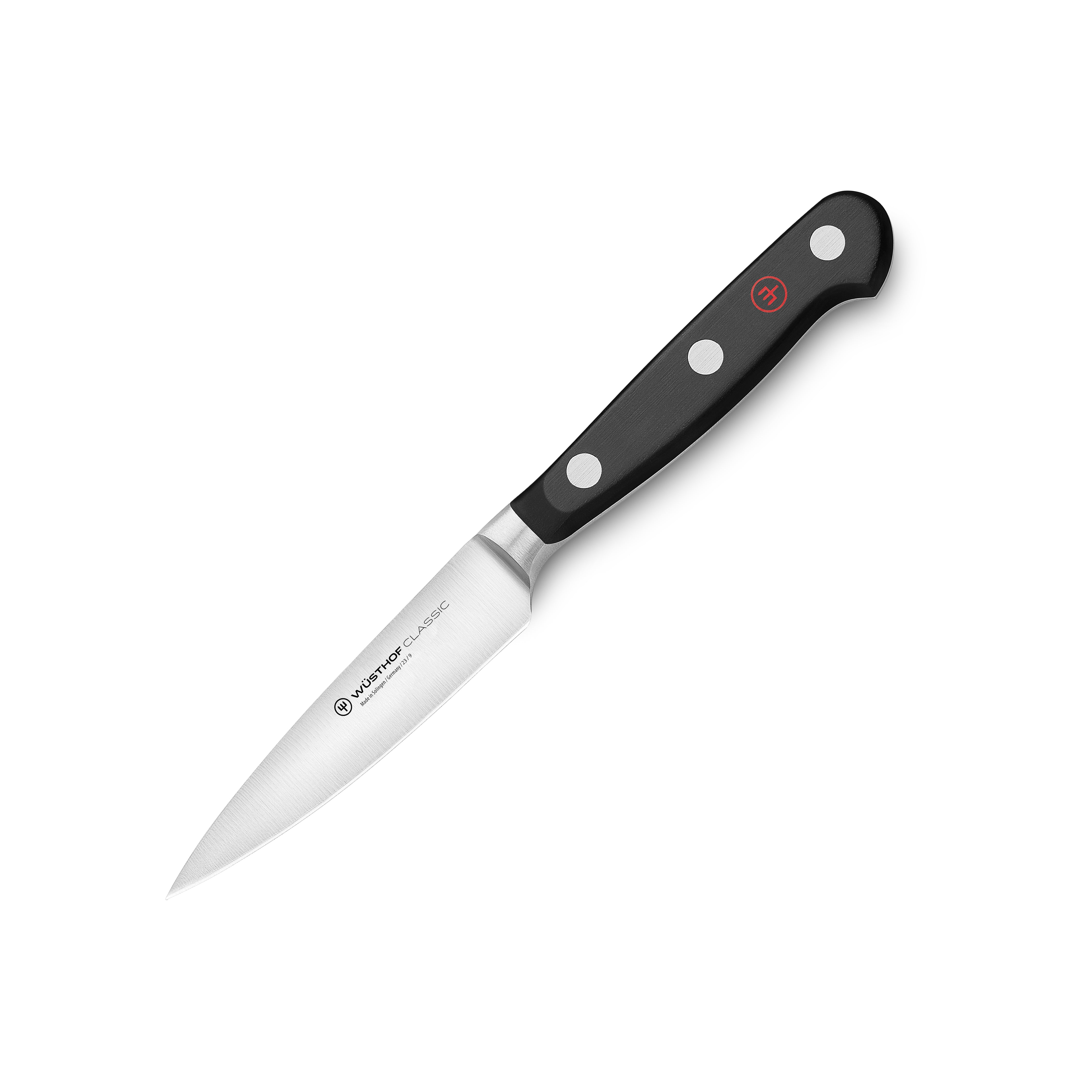 Close-up of the Wusthof Classic 3.5 inch paring knife highlighting its sharp blade and half bolster design.