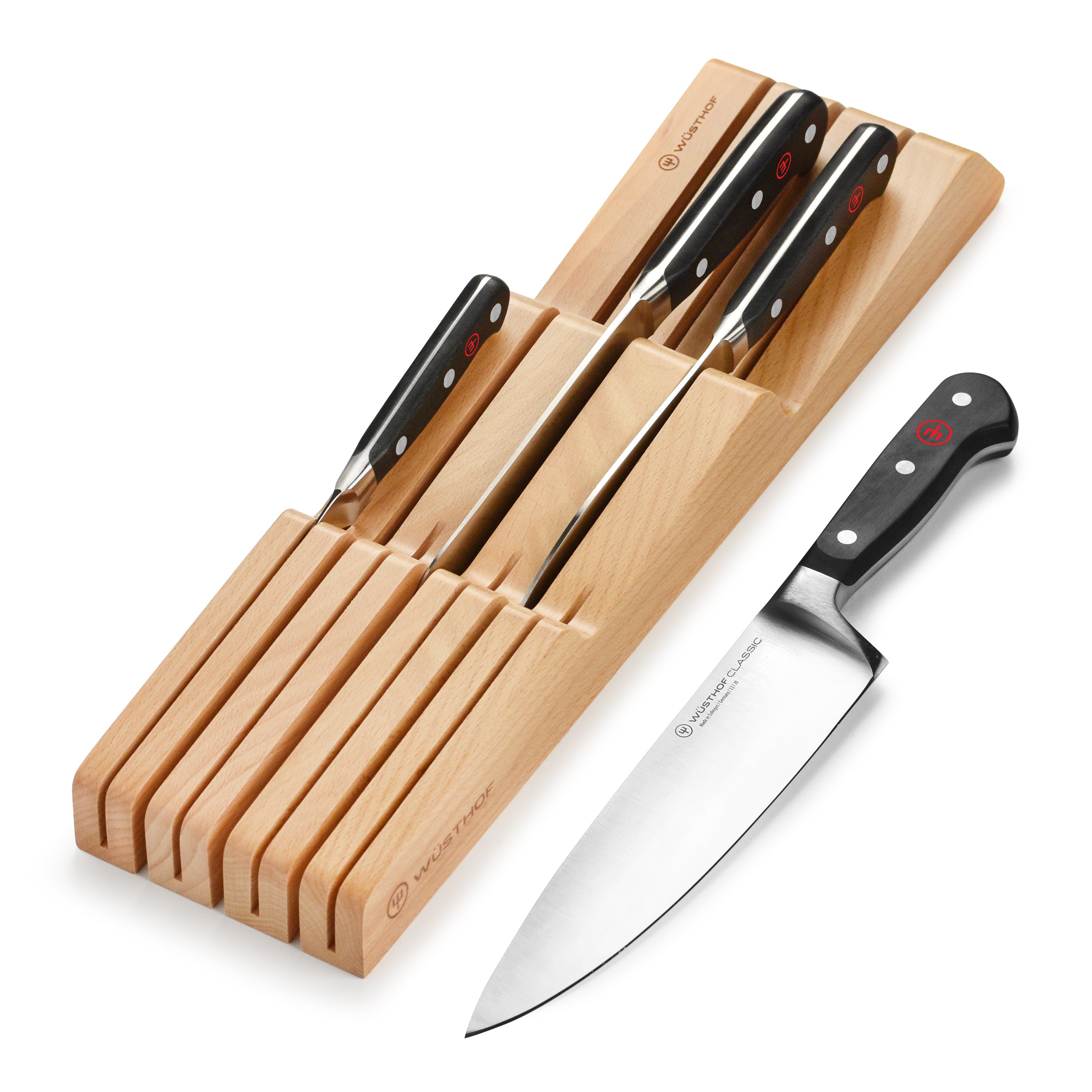 Polyoxymethylene handle of the Wusthof Classic knife, highlighting the Trident logo and craftsmanship