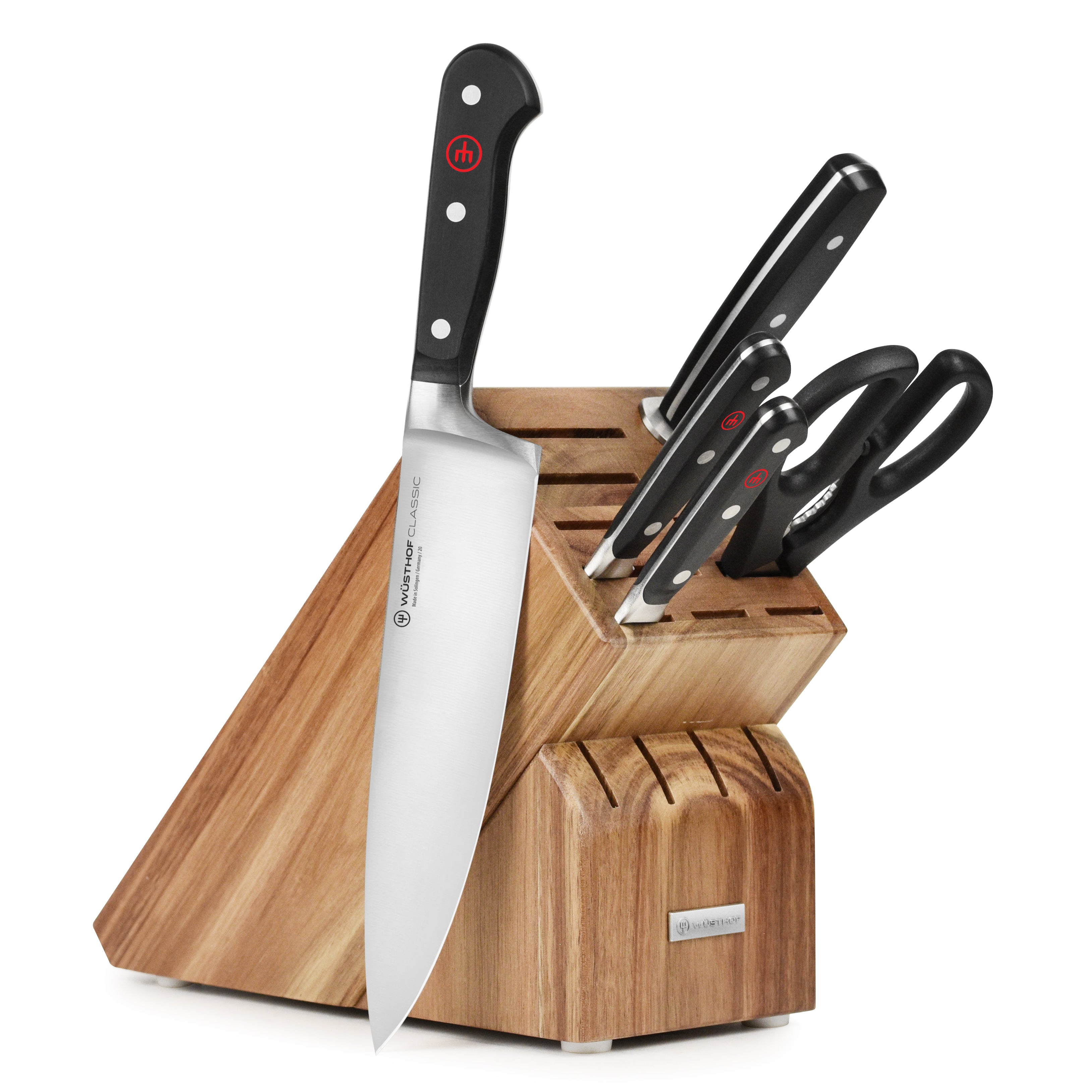 Close-up of Wusthof chef knife with high carbon steel blade in a kitchen setting