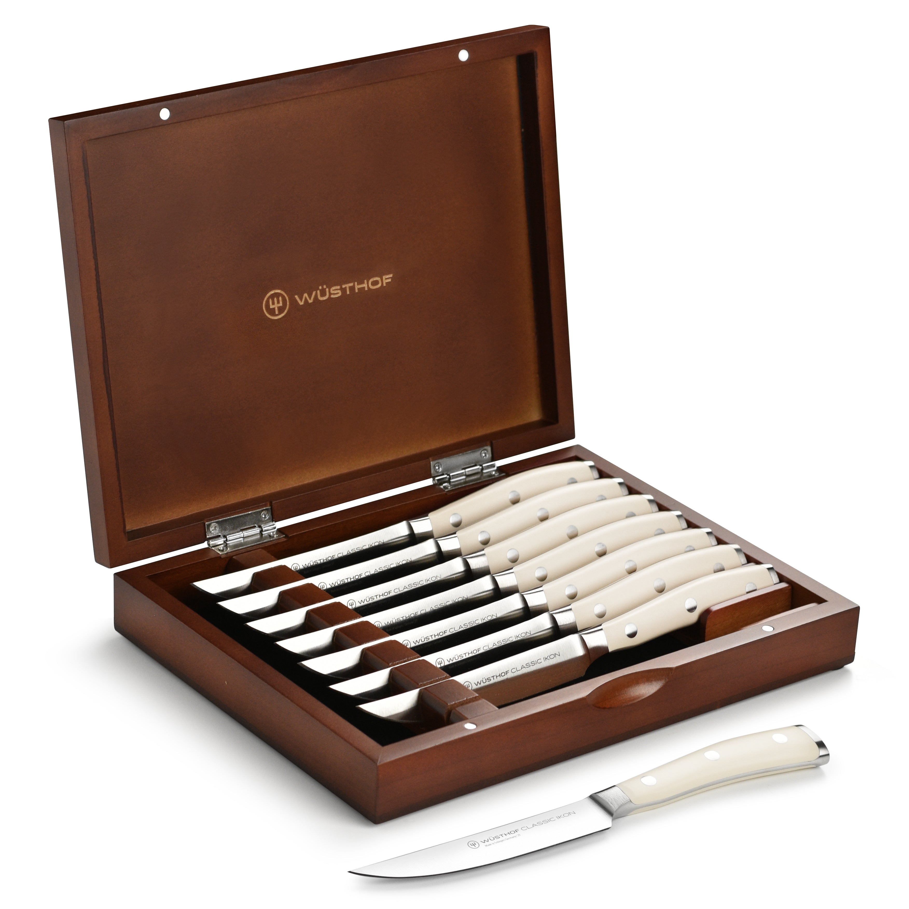 Wusthof Classic Ikon steak knife set displayed in elegant wood case from the side