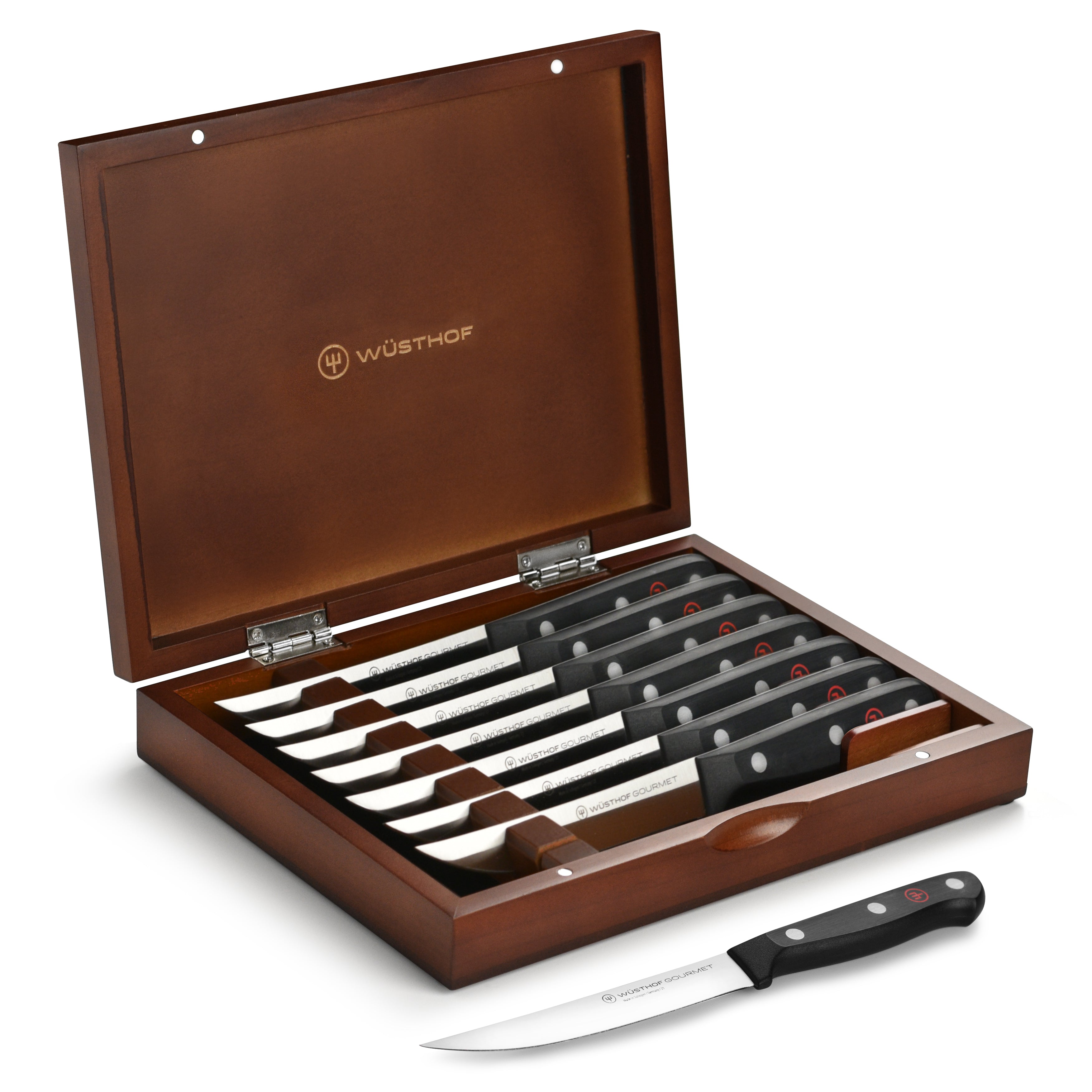 Wusthof Gourmet 8-piece steak knife set with case on a kitchen counter